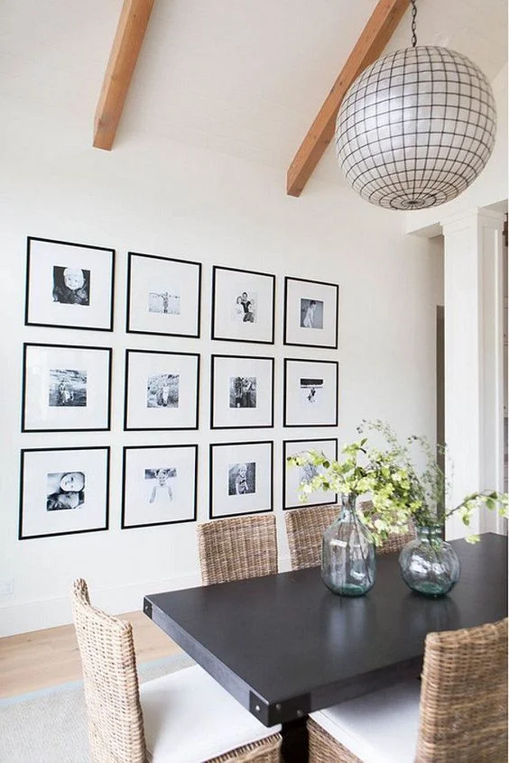 THIS GRID STYLE GALLERY WALL FROM STUDIO MCGEE LOOKS VERY CLEAN + POLISHED.