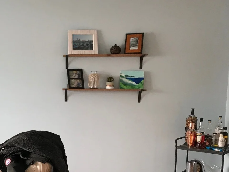 BEFORE / wall shelves with black brackets