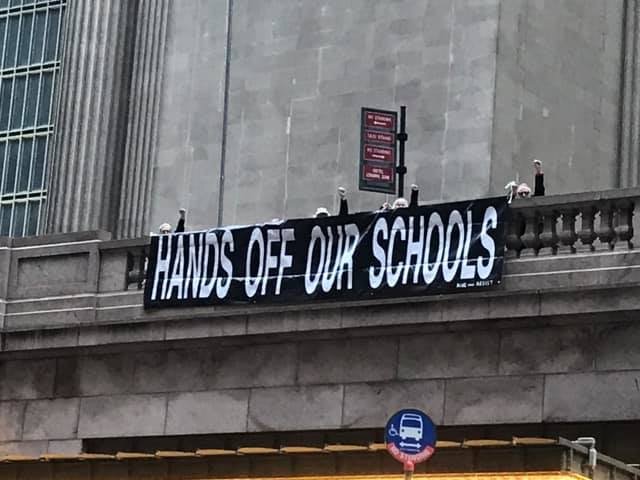 hands off schools.JPG