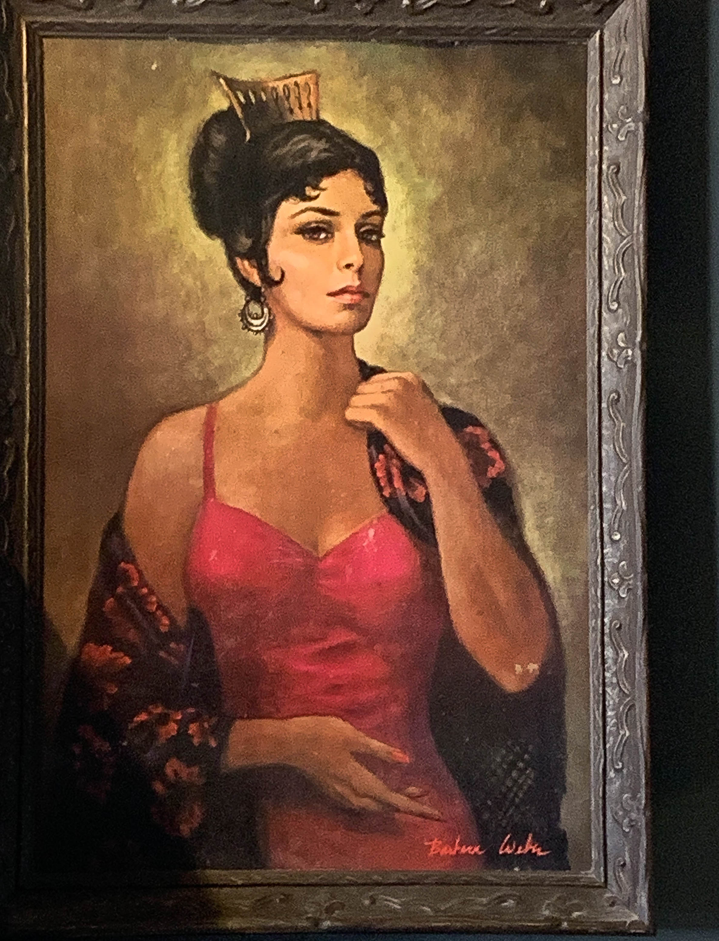 The lady of mystery hangs in Comet Cafe. No one seems to know who she is.