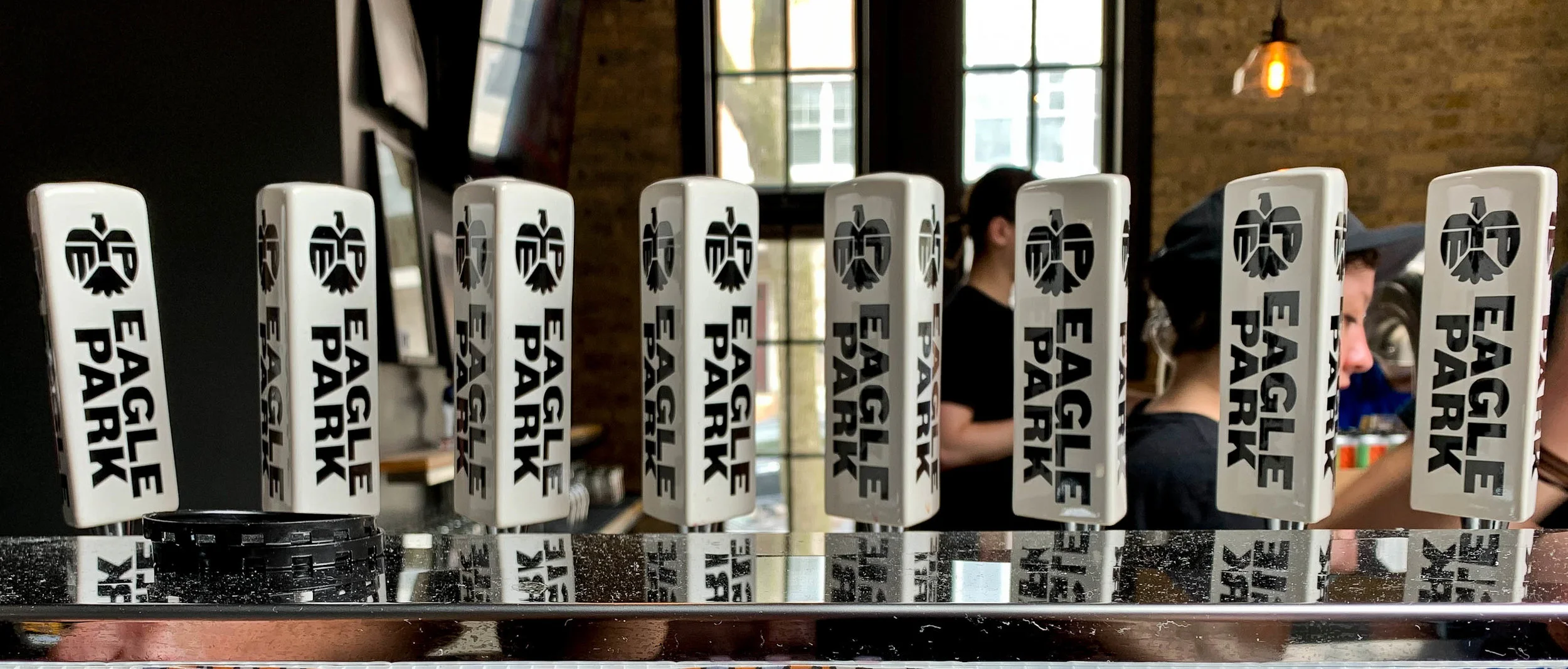 Tap handles at Eagle Park Brewing. Their patio action is a very solid option.