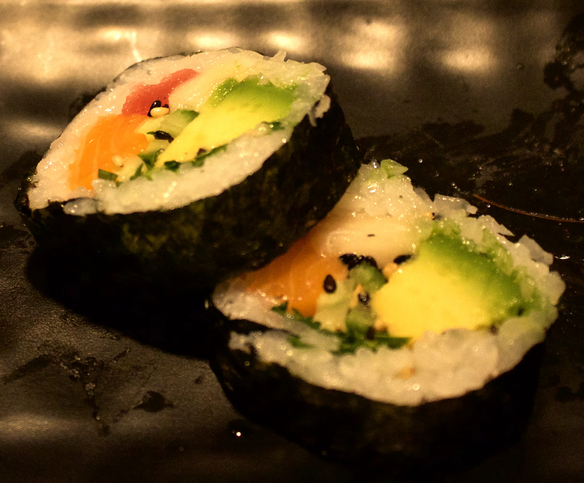 There's three different types of fish stuffed into this roll.