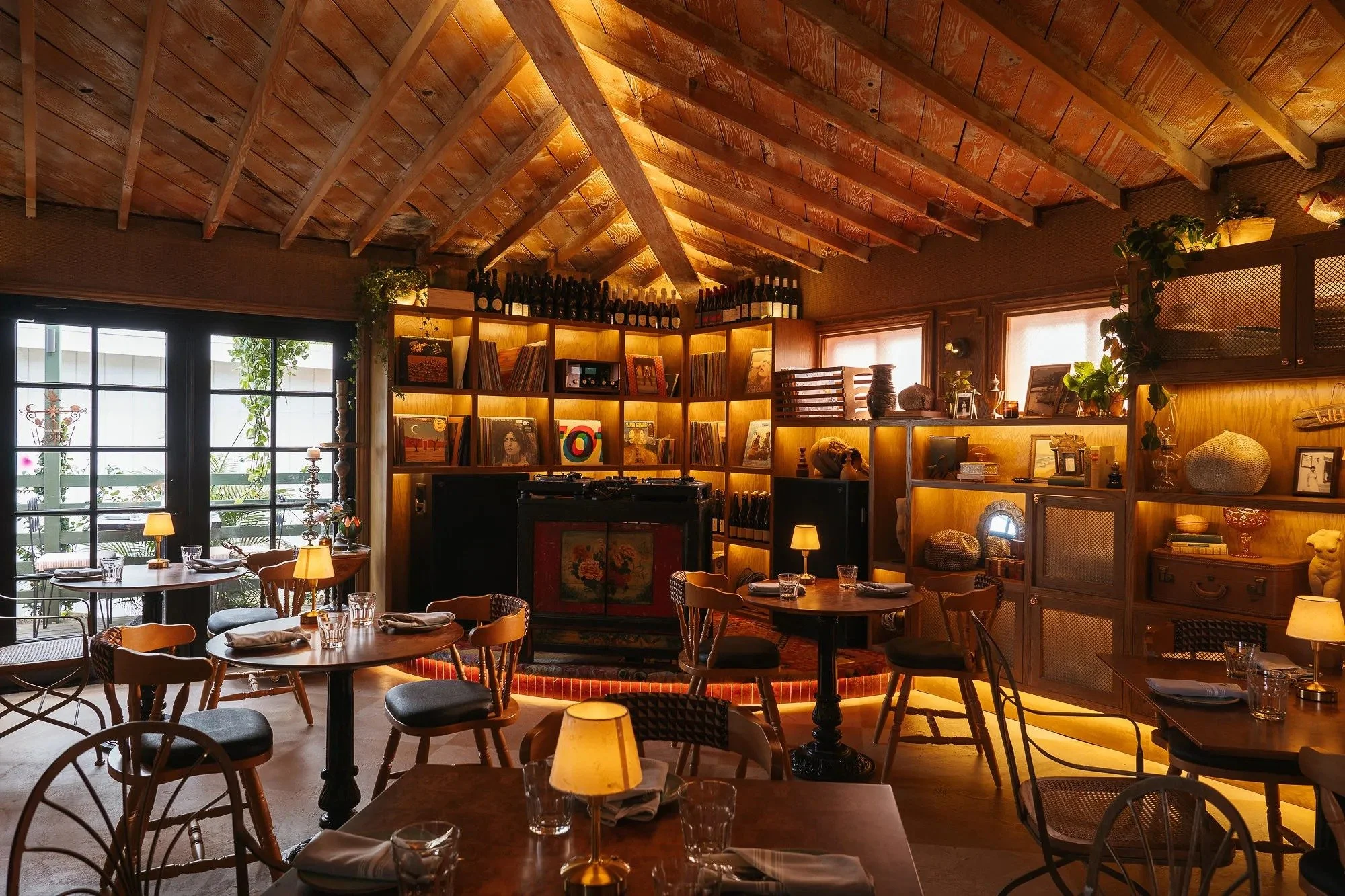 Leu Leu dining room with glowing record wall