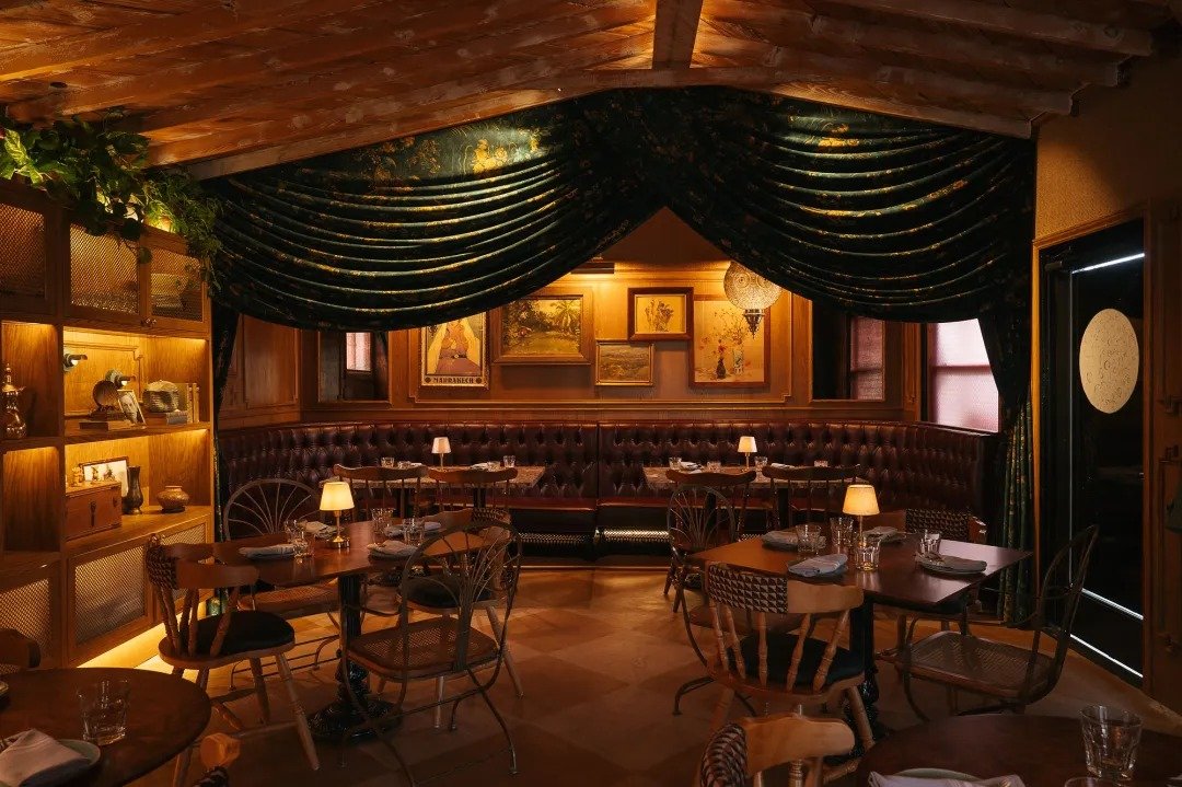 leuleu-tufted-banquette-green-velvet-drape.jpg