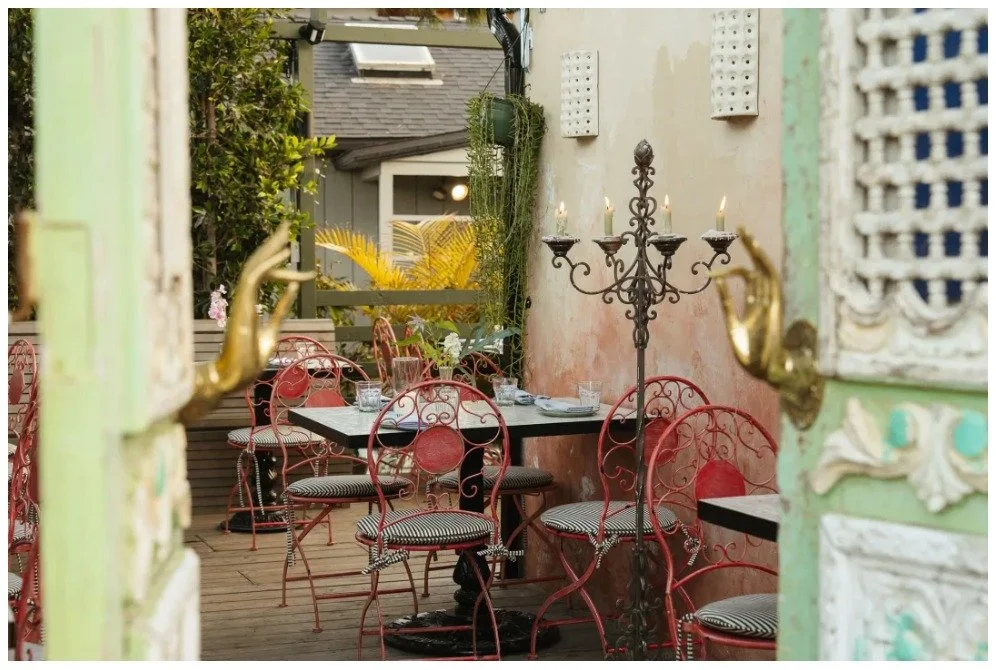 leuleu-patio-green-doors-gold-hand-handles.jpg