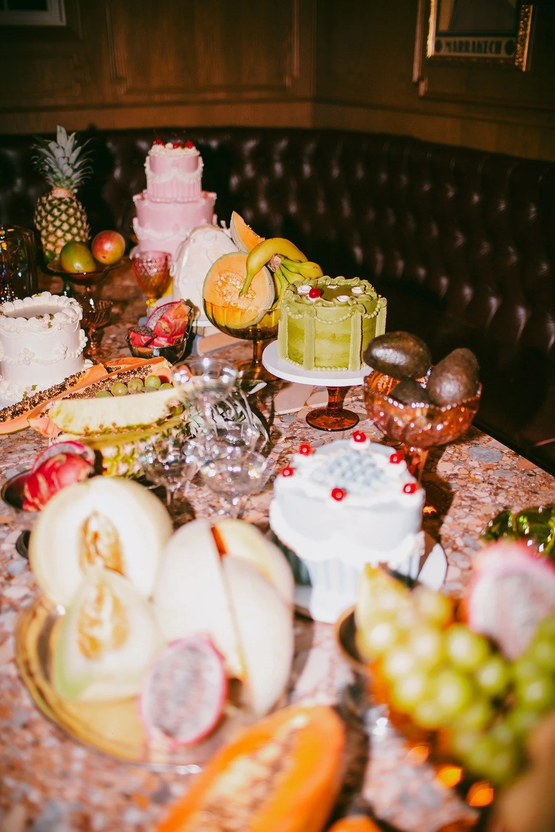 leuleu-dessert-table-cakes-tropical-fruit.jpg