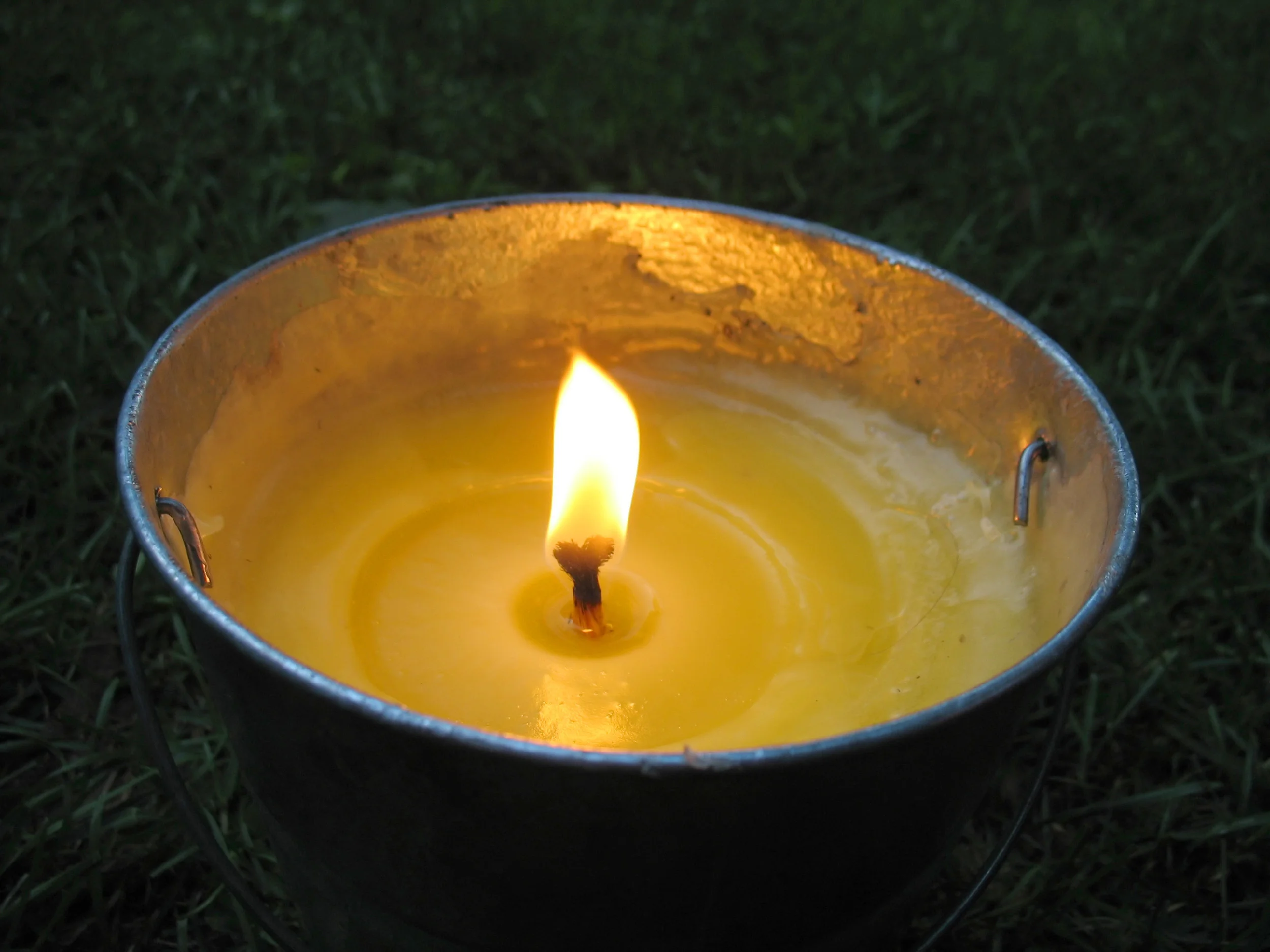 a-yellow-citronella-bucket-candle-perfect-for-those-summertime-evenings-to-keep-the-mosquitos-away_BKnxRgKCHs.jpg