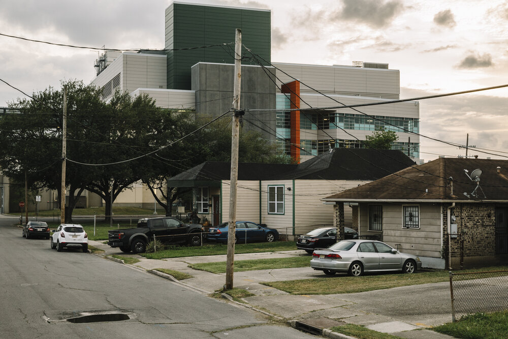  New Orleans, LA - April 6, 2020 - The New Orleans Justice Center, a $145 million complex opened in 2015, looms over residential buildings in the surrounding Mid-City neighborhood. 