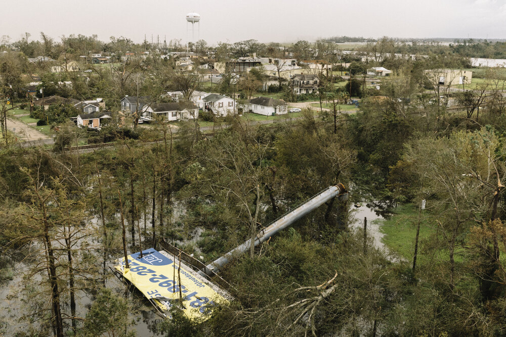  NYTSTORM - Lake Charles, LA - August 27, 2020 - Westlake, a small community across the river from Lake Charles that is surrounded by industrial plants, is obscured by smoke from a large fire in a BioLab industrial site across the interstate. Hurrica