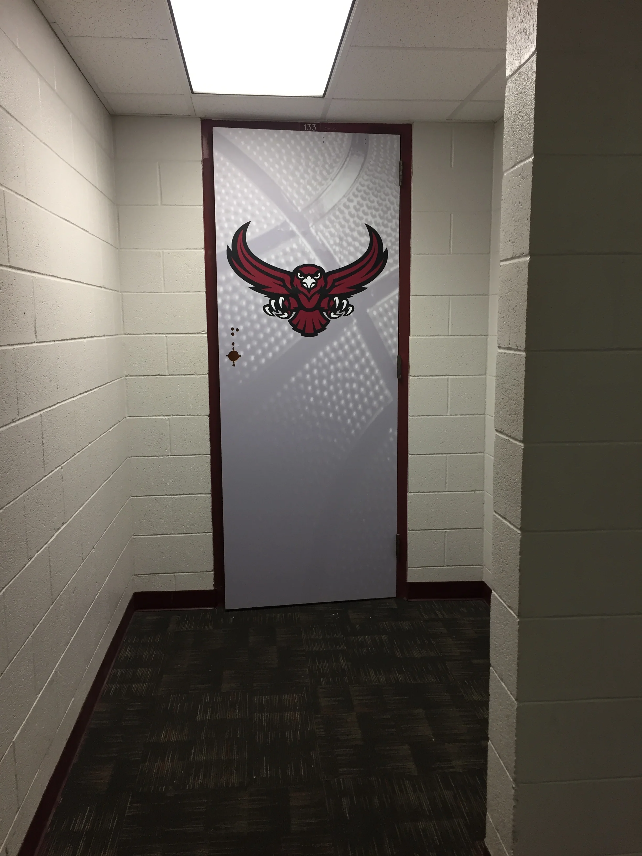 McMurry Men's Basketball Locker Room Door