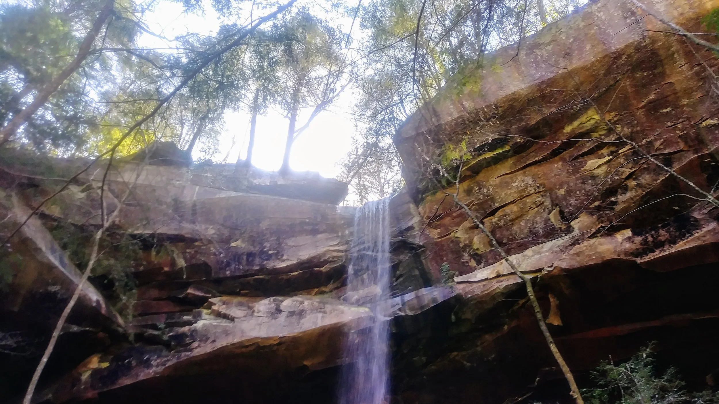 Looking up at the top of Yahoo Falls.