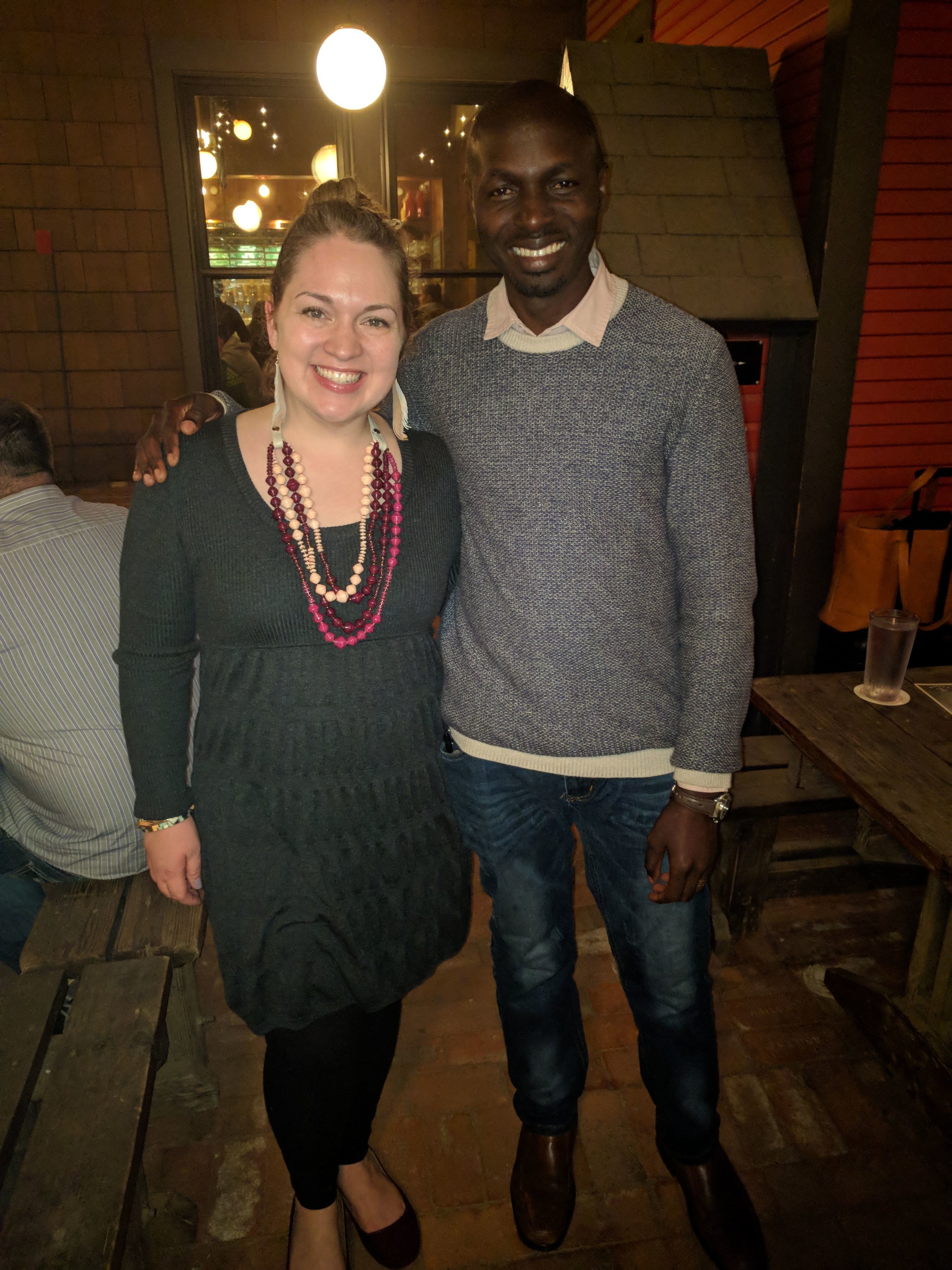 Here I am with the Feathered Fringe Earrings, with a bold necklace - but I moved the necklace’s volume down a bit. This is the Plum Rope Necklace, made with hand-rolled paper beads in Uganda, and the man next to me is Daniel, who leads that group! The leather extender from the Zelda Necklace added versatility to this piece.