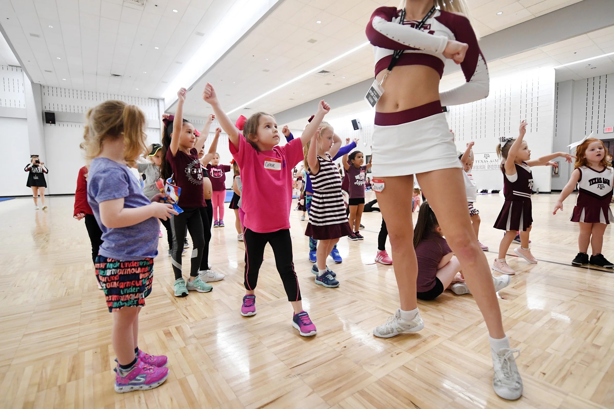 The Texas A&M Cheer Squad hosts a clinic for children ages 3-14 at the Student Recreation Center on Saturday, Jan. 19, 2019, in College Station, Texas. Participants played games, learned cheers and practiced jumps and tumbling skills. (Laura McKenzie/The Eagle)