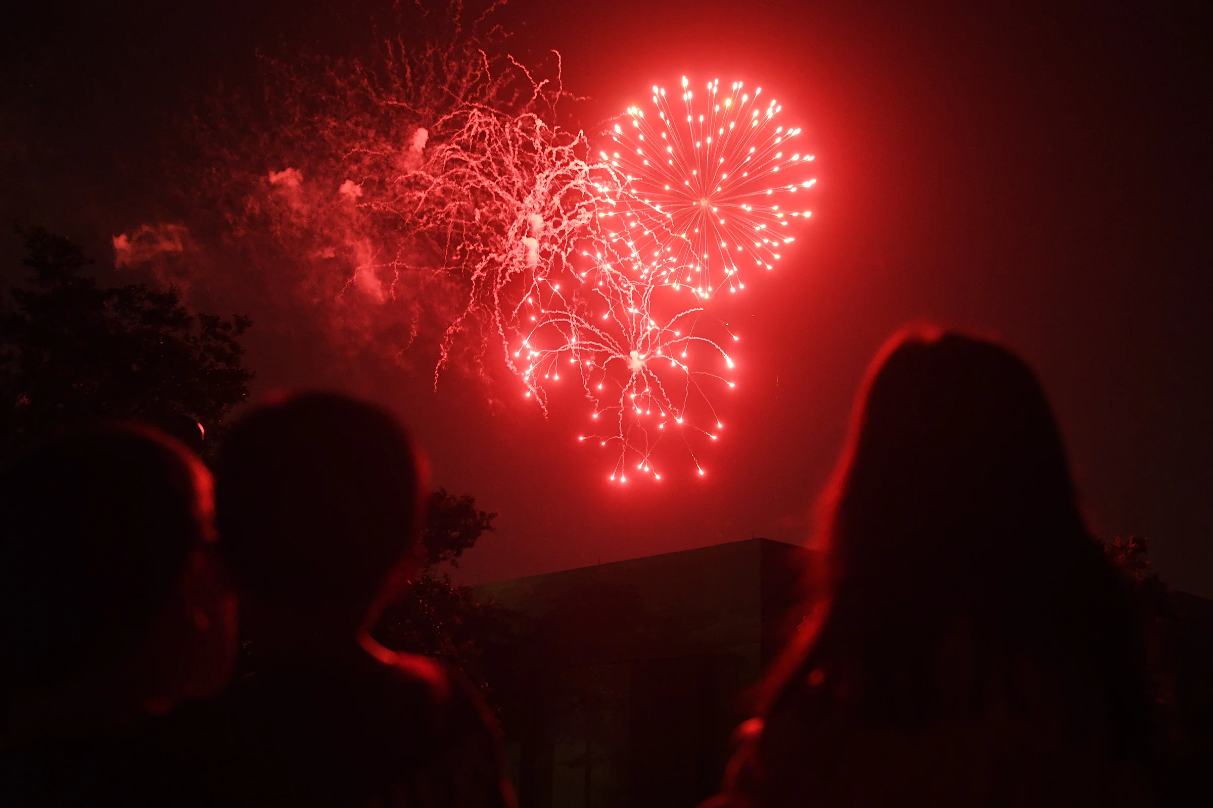 Fireworks explode over the George H.W. Bush Presidential Library and Museum during the College Station Noon Lion Club's "I Love America" Fourth of July Celebration in College Station, Texas. (Laura McKenzie/The Eagle)