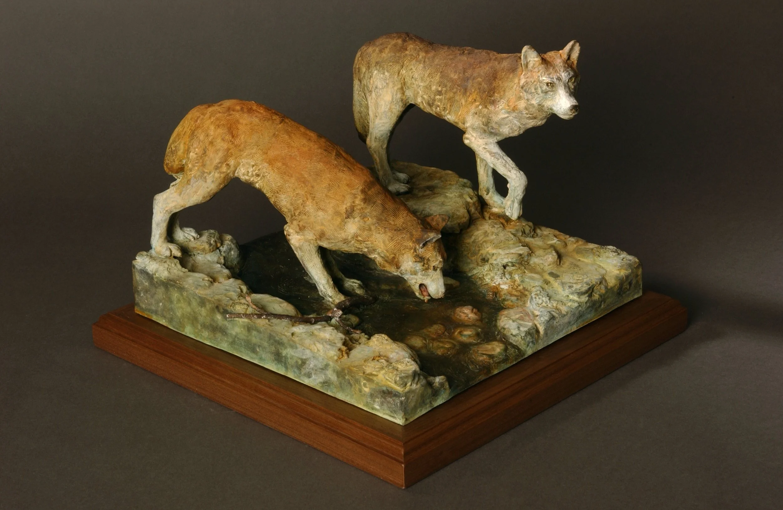  Mexican Wolves  Bronze, wood  14” x14” x 9” 