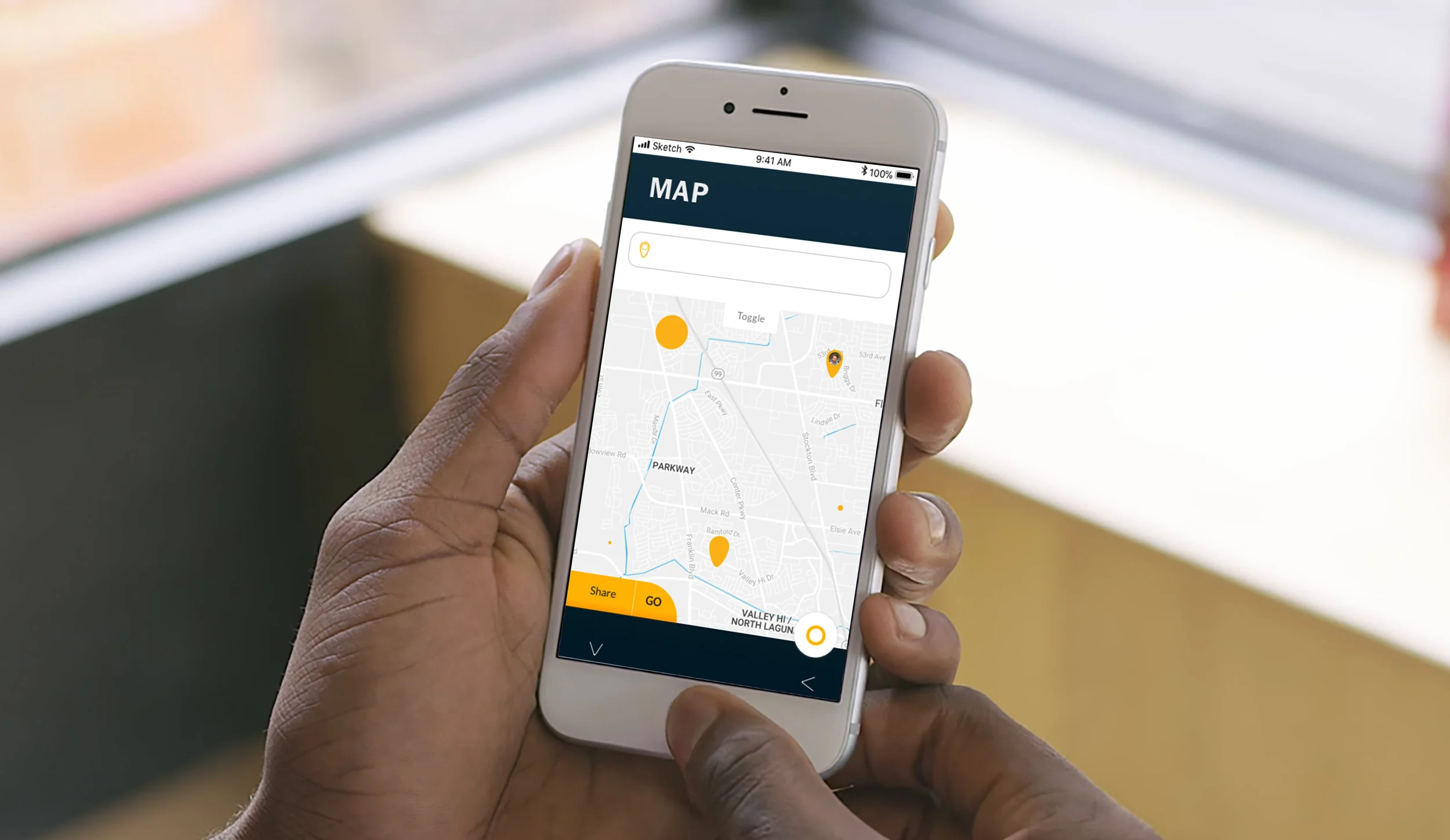 Phone_in_hand_Map.jpg