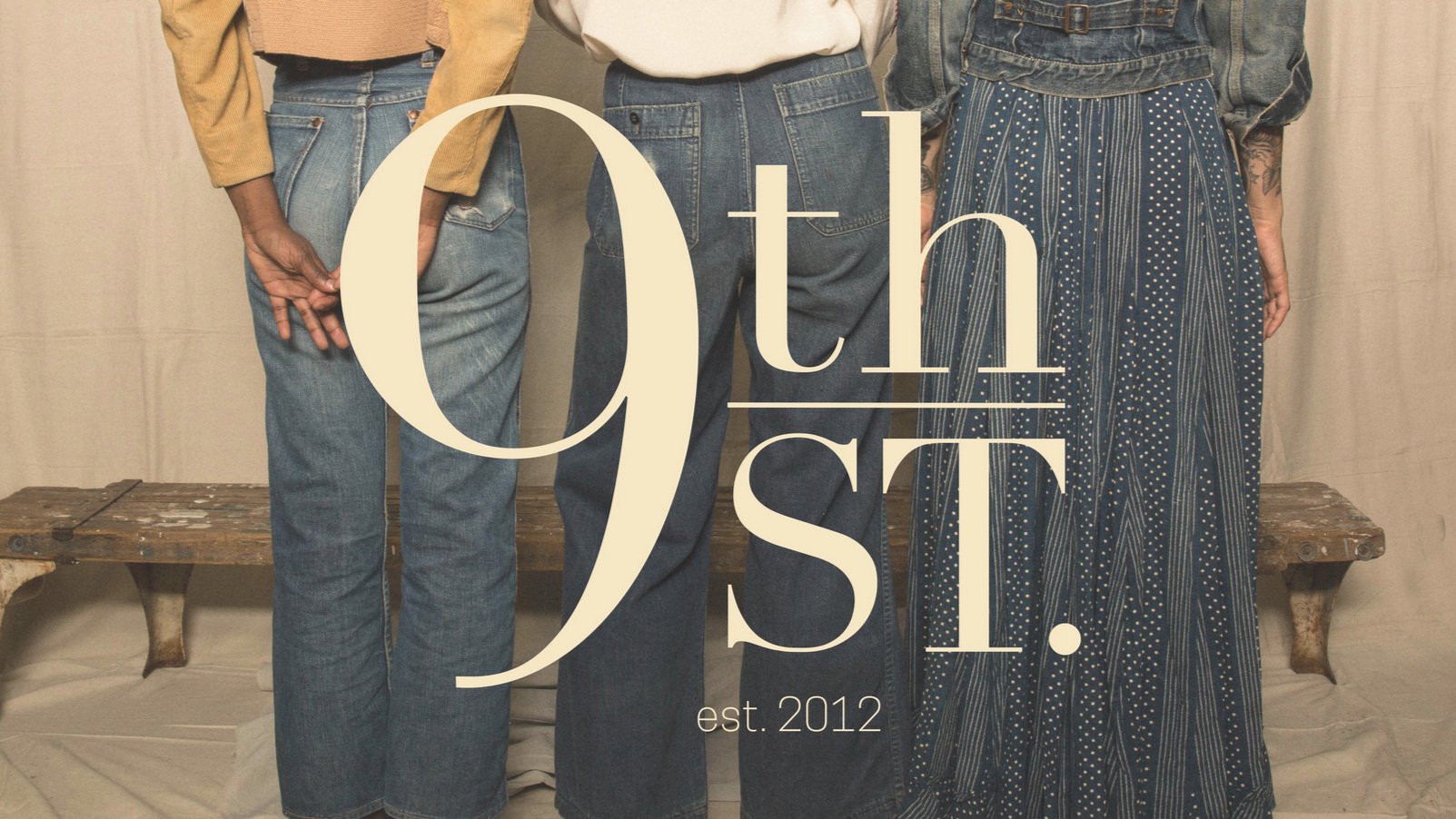 three women standing with their backs to the camera on the far left wearing vintage Levi's, in the middle vintage sailor denim, on the right a vintage long calico navy skirt with 9th St. Vintage branding overlaid