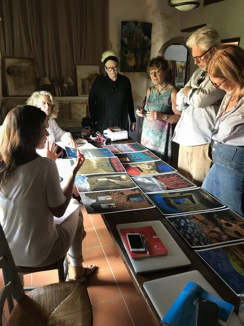 A critique session with a mentor and the students