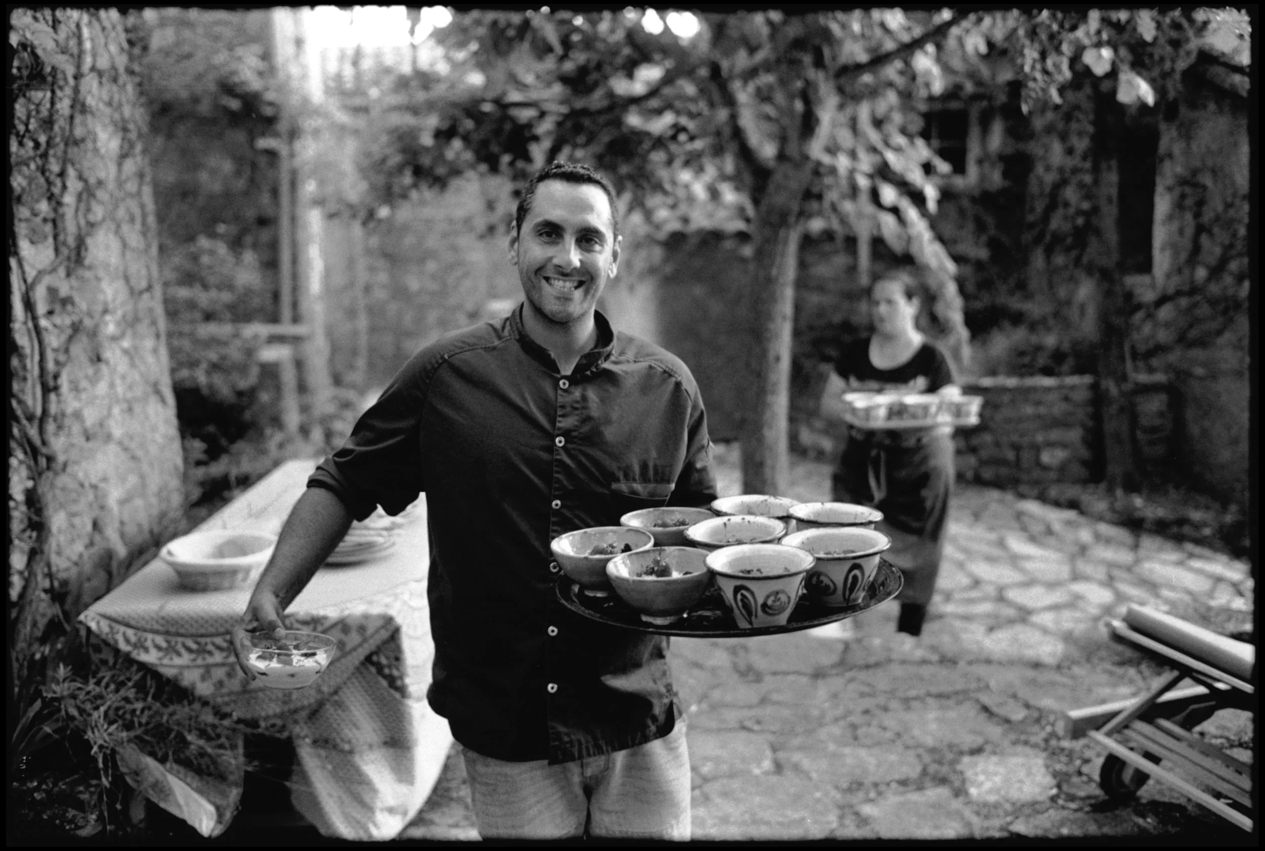 2018 Photo Contest Winner of the ‘Moments’ Category: Barry Munger. Chef -in-Residence Marc Dussaud serves the deserts.