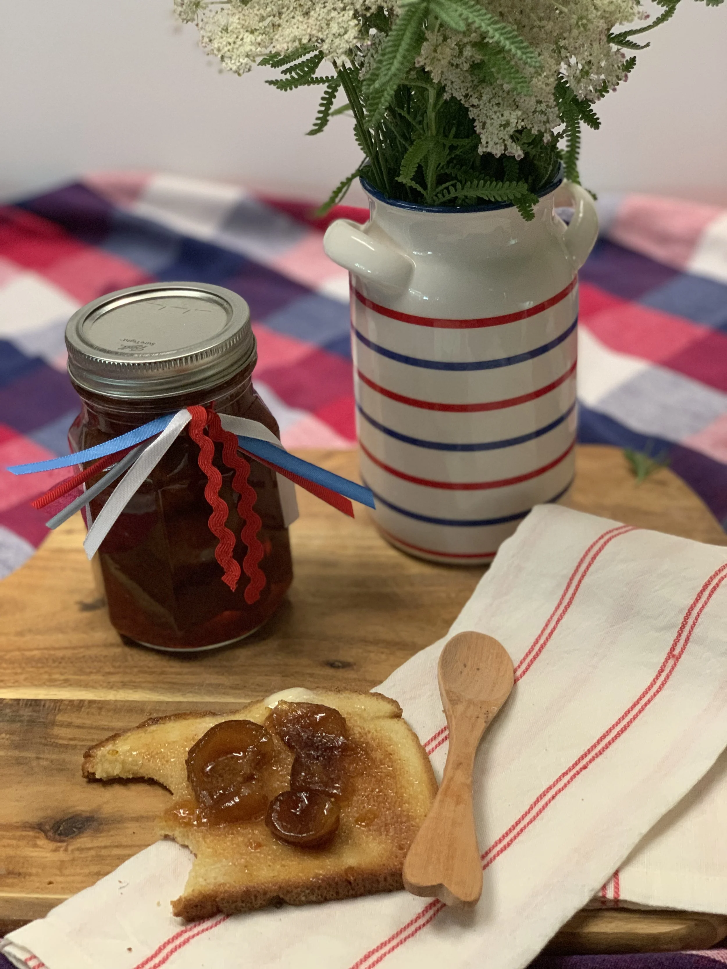 Fresh figs in syrup on buttered toast. It is also fantastic on brie, goat cheese baguettes, or simply drizzled over ice cream. Bon Appetit!