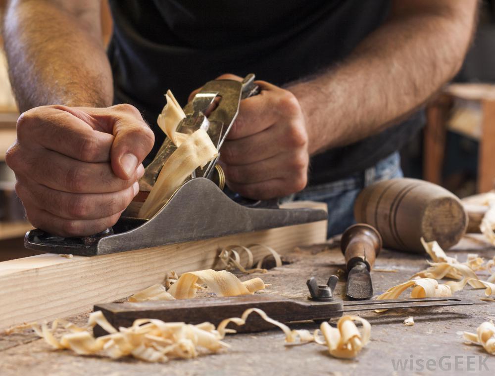 man-working-with-wood-with-shavings.jpg