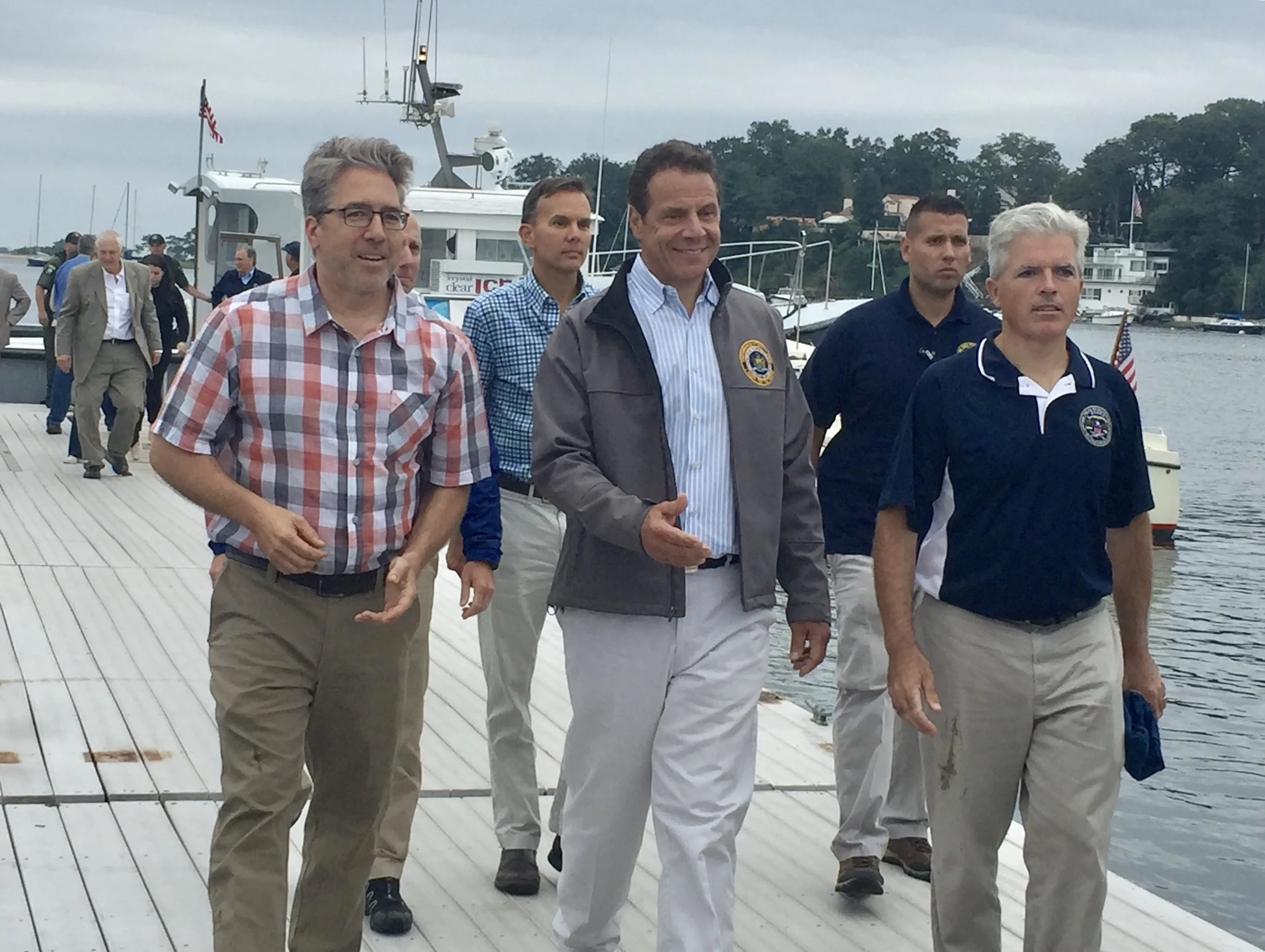 Front left to right: CCE Marine Program Director Chris Pickerell; NYS Governor Andrew Cuomo; Suffolk County Executive, Steve Bellone.