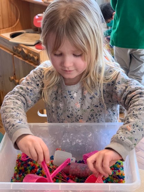 Preschooler Exploring Water Beads