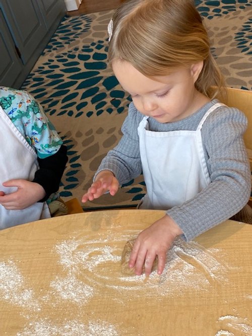 Preschooler Playing with Flour