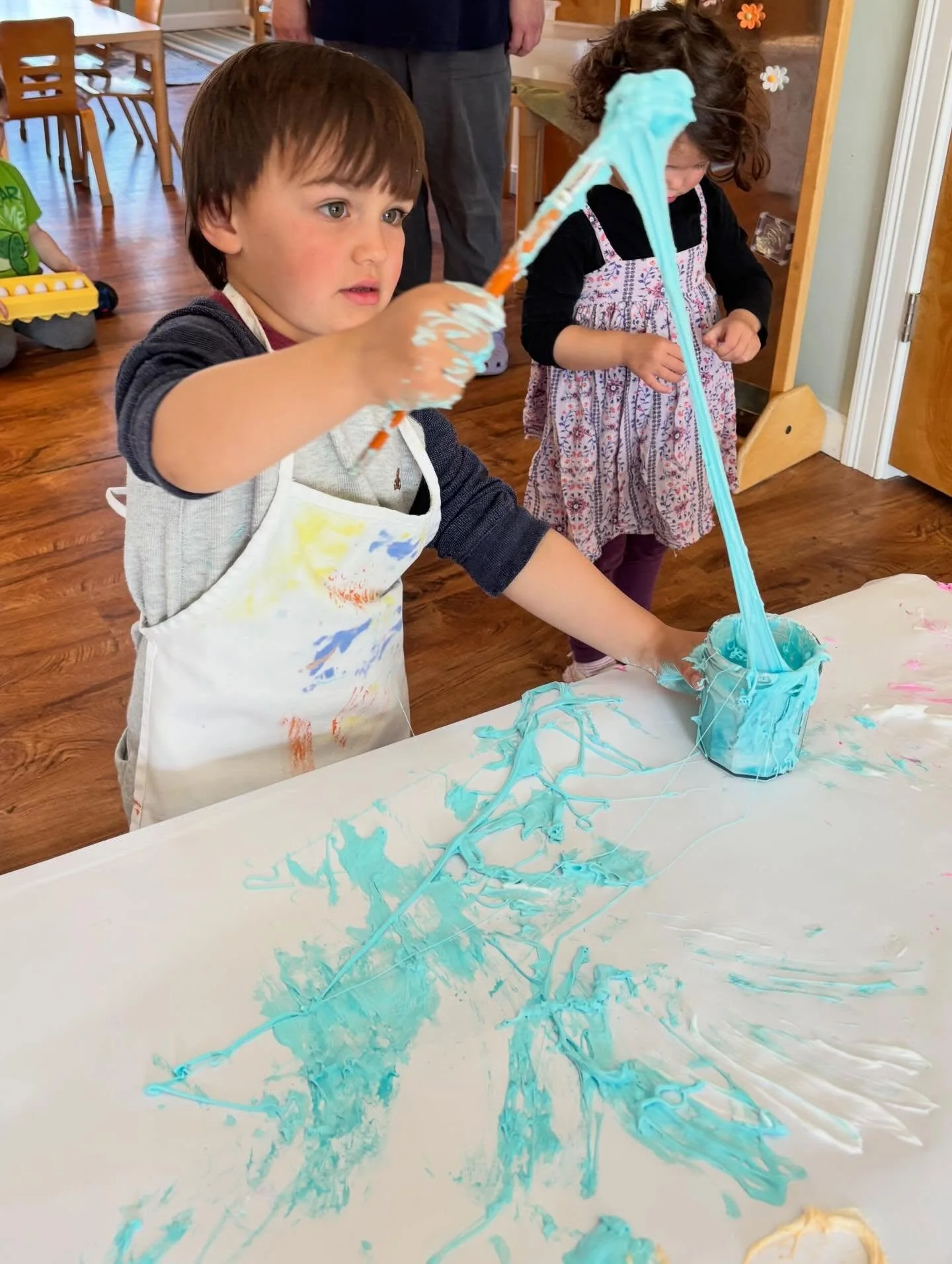 Hands plunge, stretch, swirl, and lift. Paint becomes something more&mdash;silky, sticky, airy, resistant. It clings, drips, and stretches, inviting children to slow down and truly feel. This is sensory play in its richest form, where the body and mi