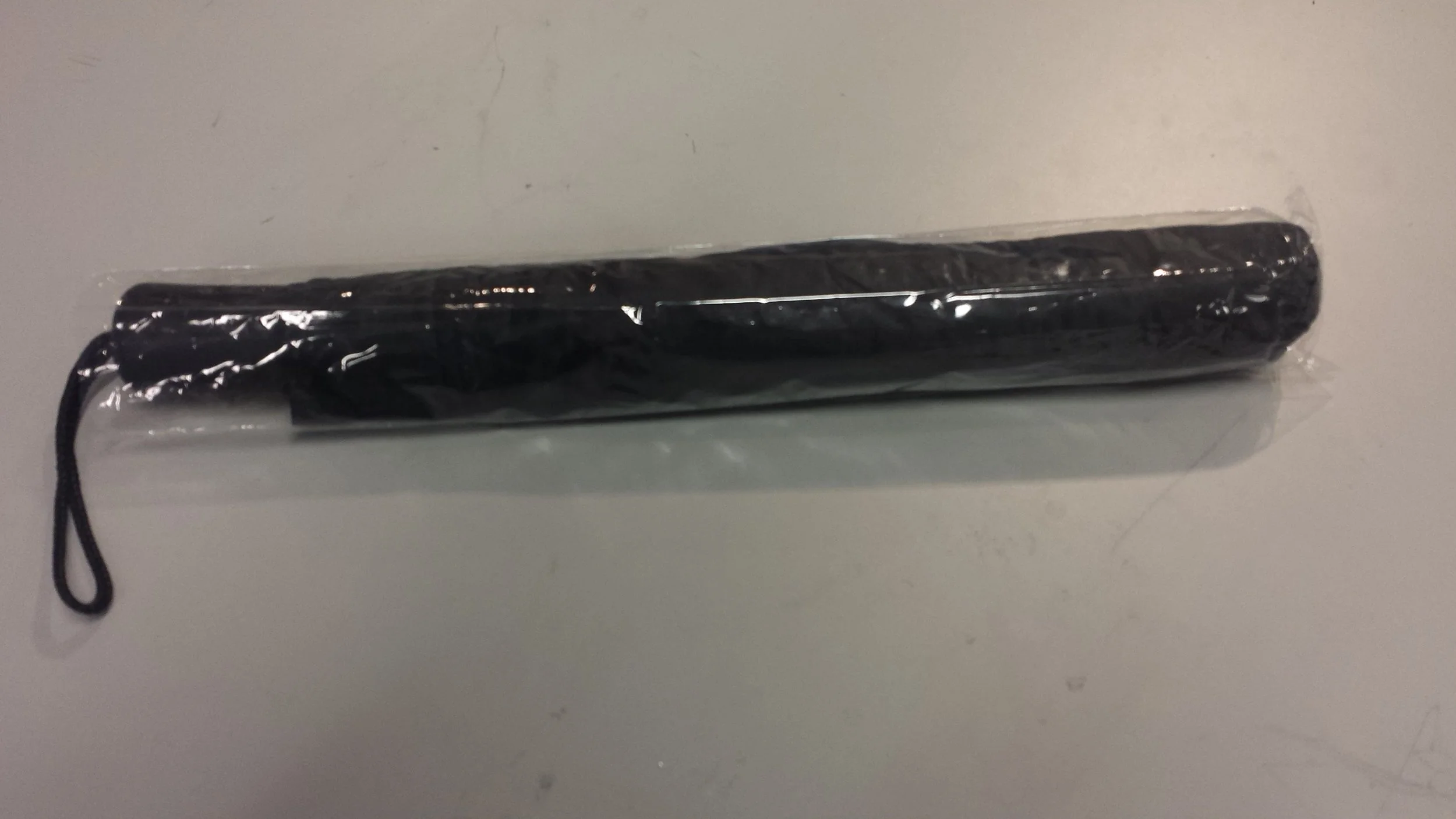 I went to a local store and found a cheap little umbrella. It cost me $6.