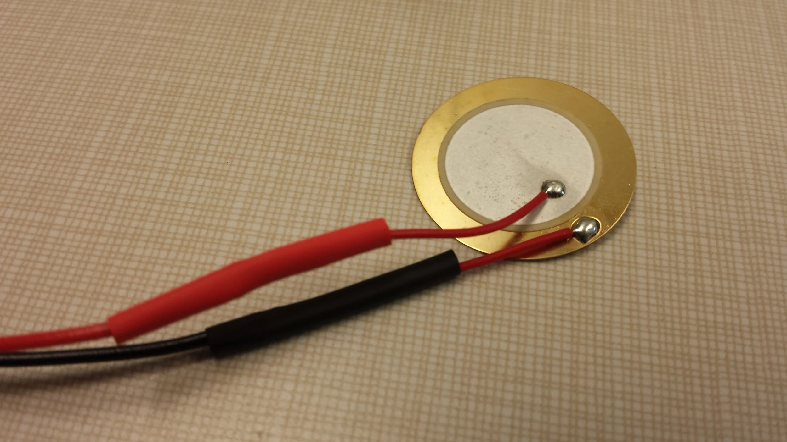 The two wires that run to the piezo are incredibly fragile, so reinforcement here was key.
