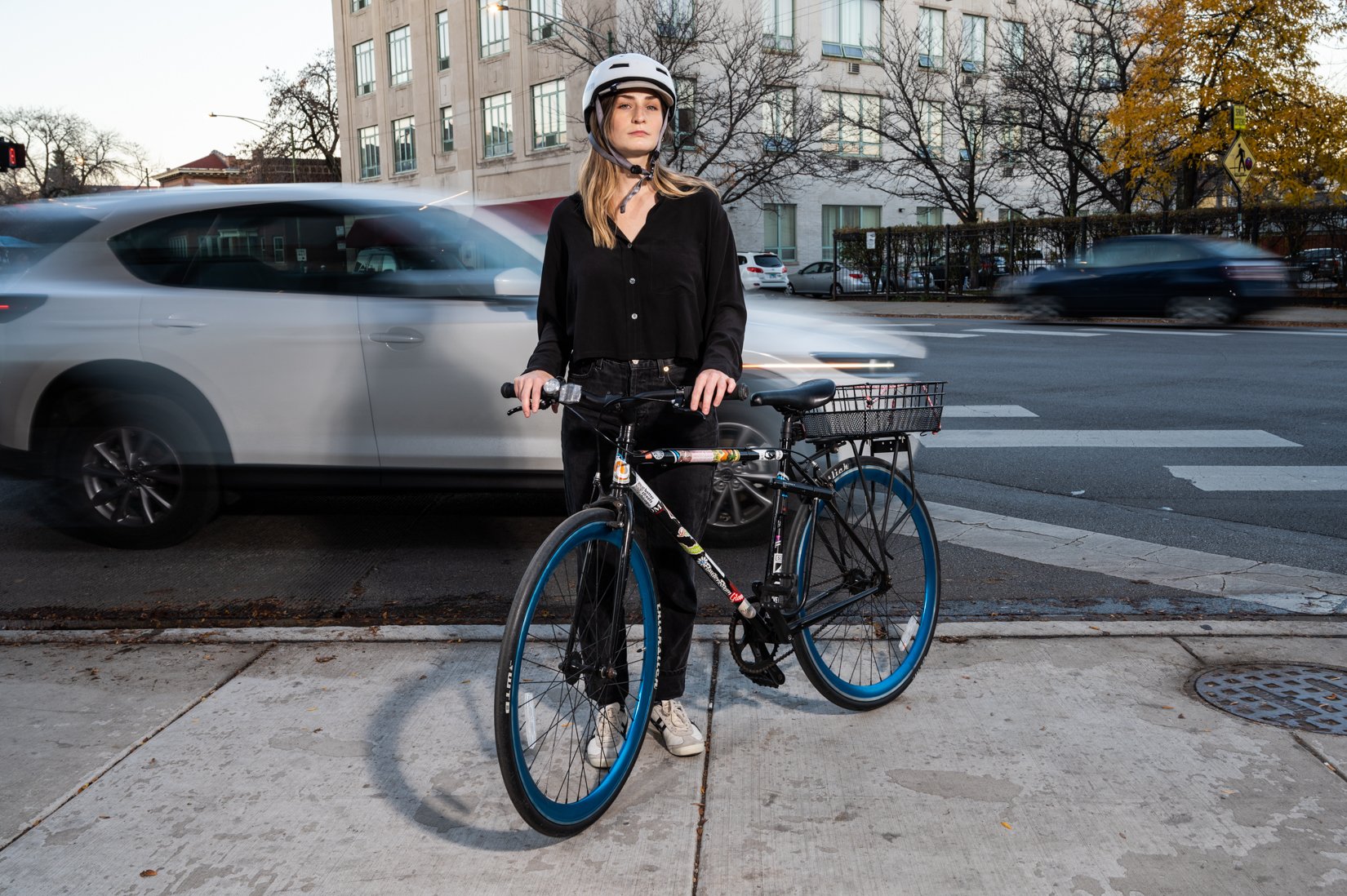  Cyclist Grace Hebert poses with her bicycle near Milwaukee and Sacramento avenues in Logan Square on Nov. 1, 2022. 