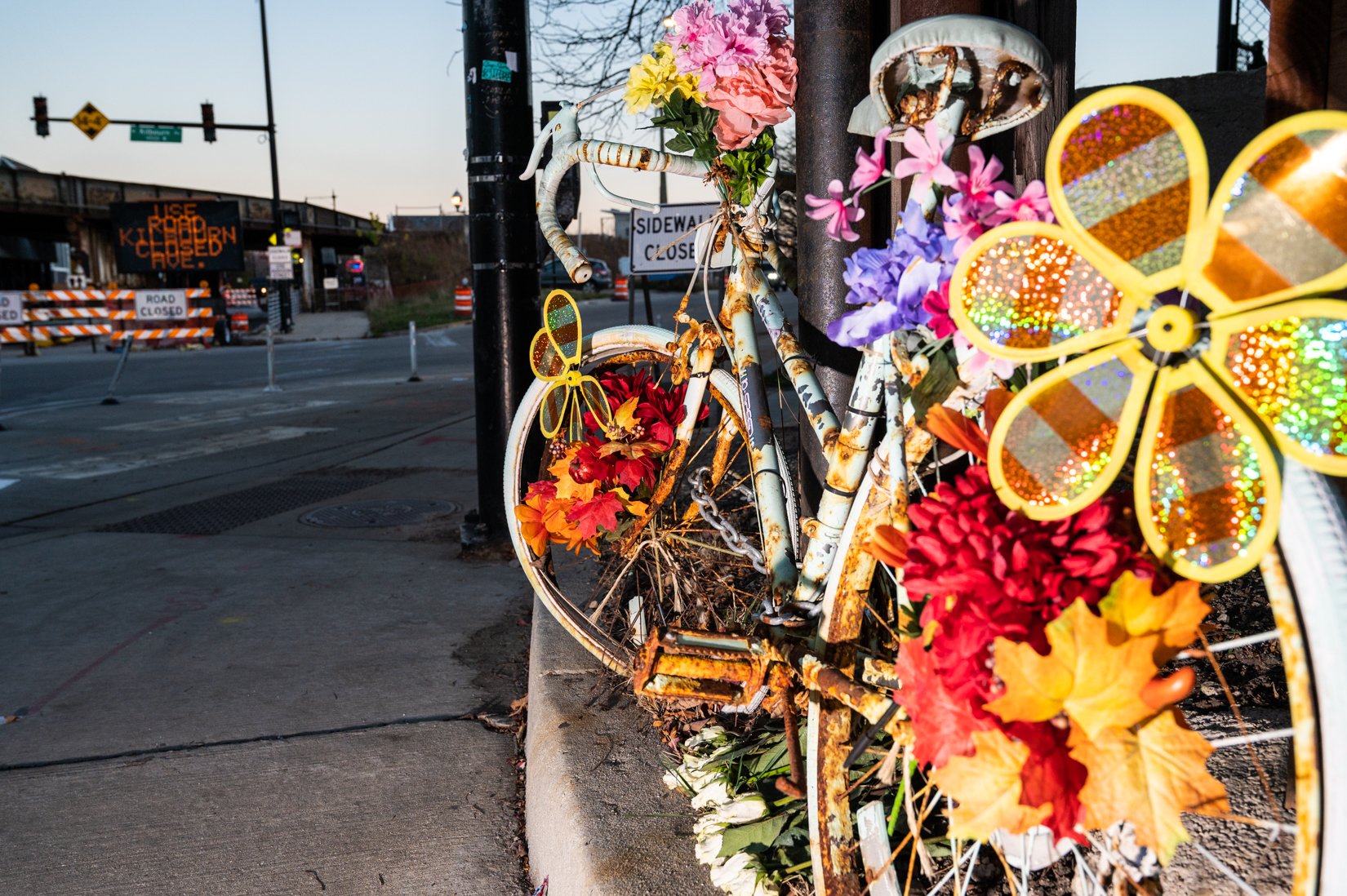  A ghost bike is adorned with flowers in the 3800 block of North Milwaukee Avenue in Irving Park, as seen on Nov. 10, 2022. 