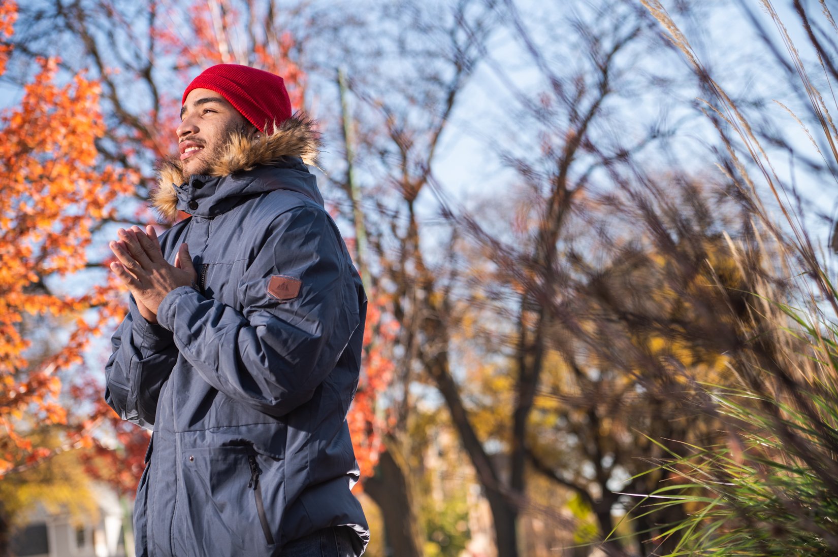  Yorvi Sánchez warms his hands as he posed for a portrait in West Ridge on Nov. 1, 2022. | Colin Boyle/Block Club Chicago 