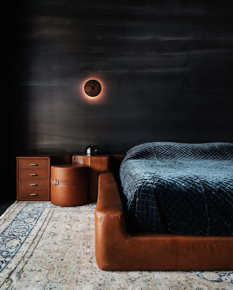 A beautiful Calico wallpaper adjorns a bedroom, @melanieraines.
