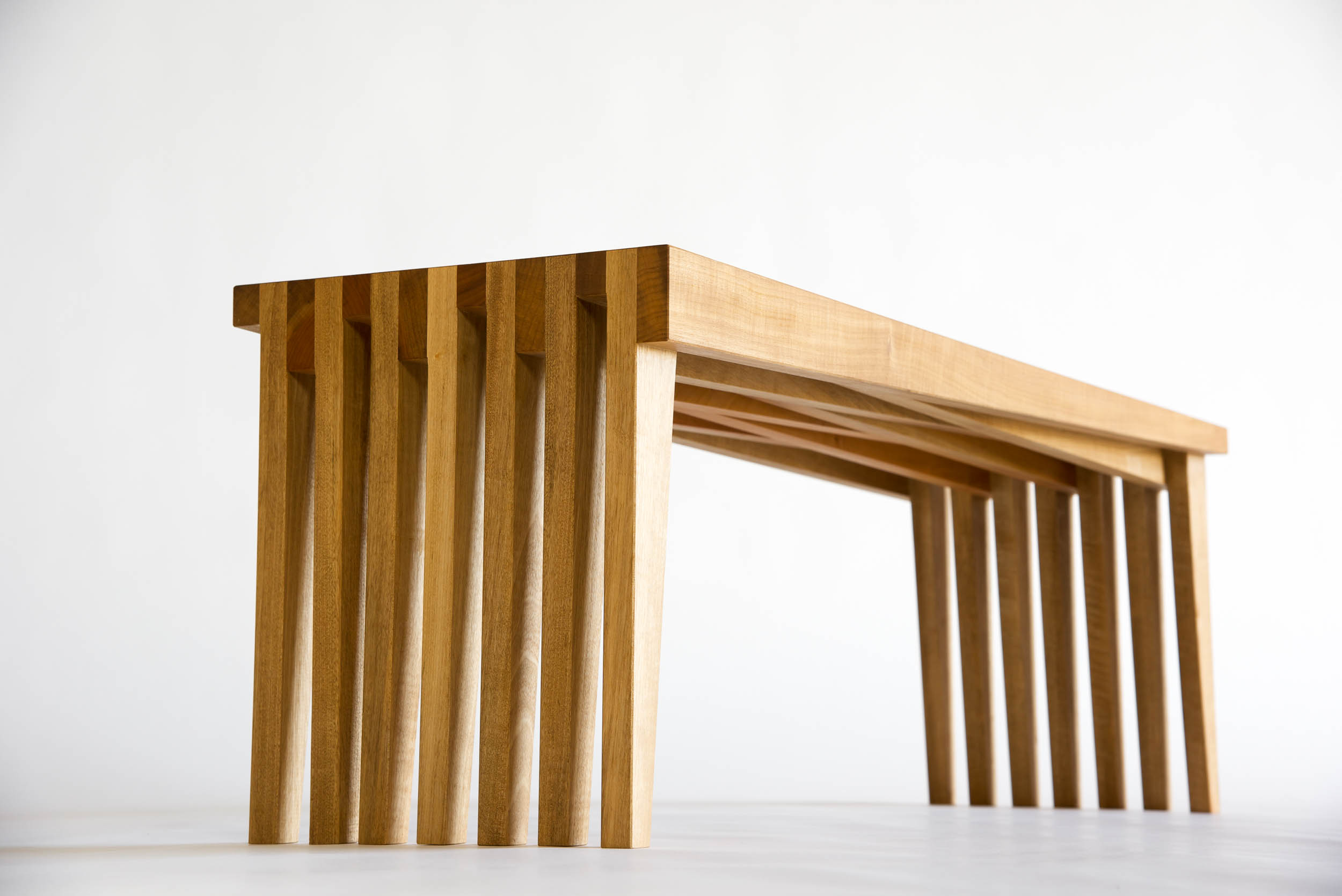 The Library Bench can be made in different lengths. This one is 42 inches long, made in Bay Laurel, and finished with oil.