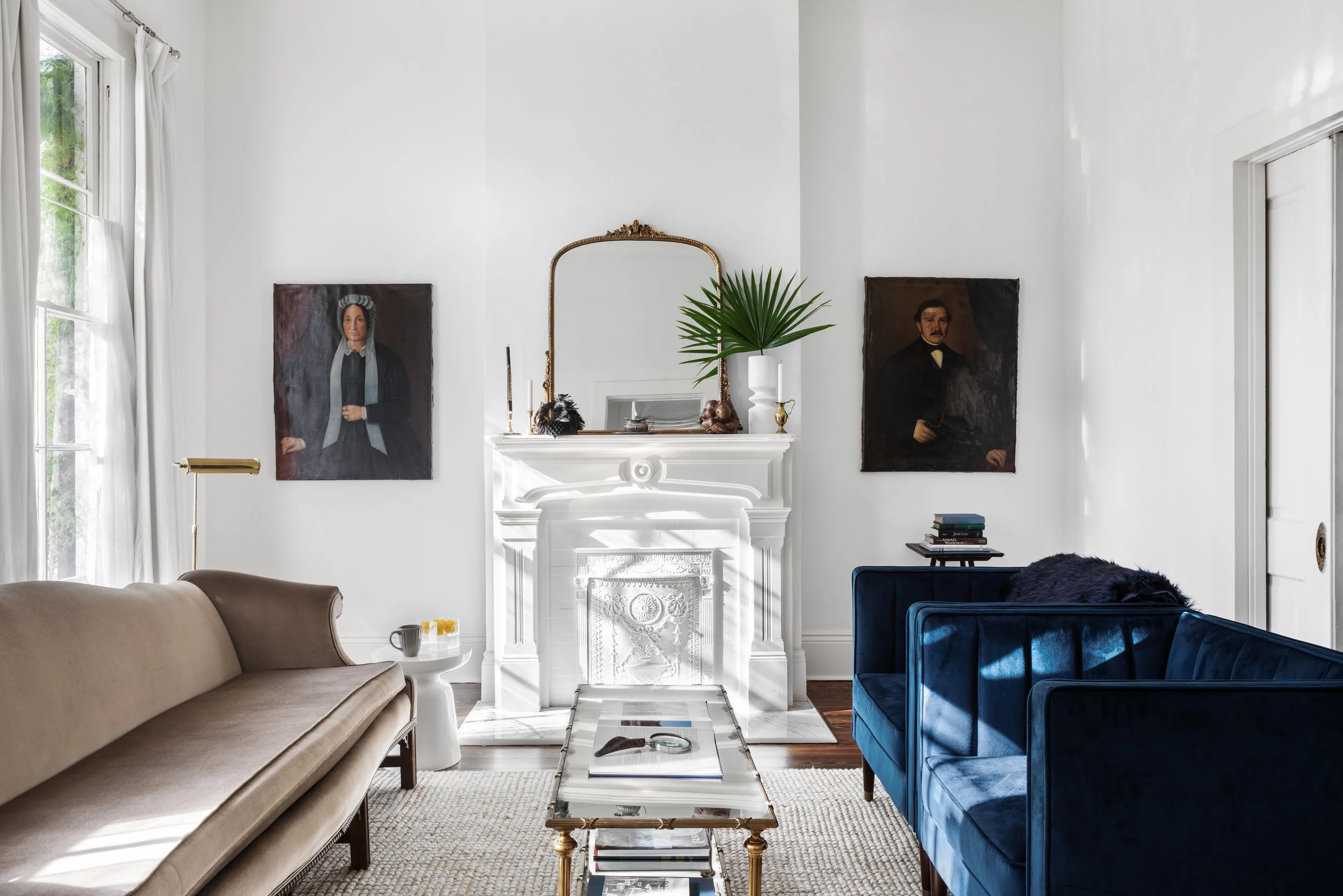 These velvet sofa and chairs really add warmth to the crisp white walls and high ceilings. The sofa is from an estate sale and the chairs are from Target.