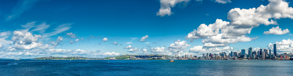 sean-hoyt-seattle-magnlia-skyline-blue-sky-1.jpg