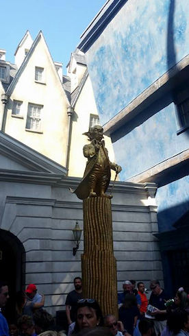 Harry Potter World's Gringott's Statue showing you all the coinage you can save with these tips.
