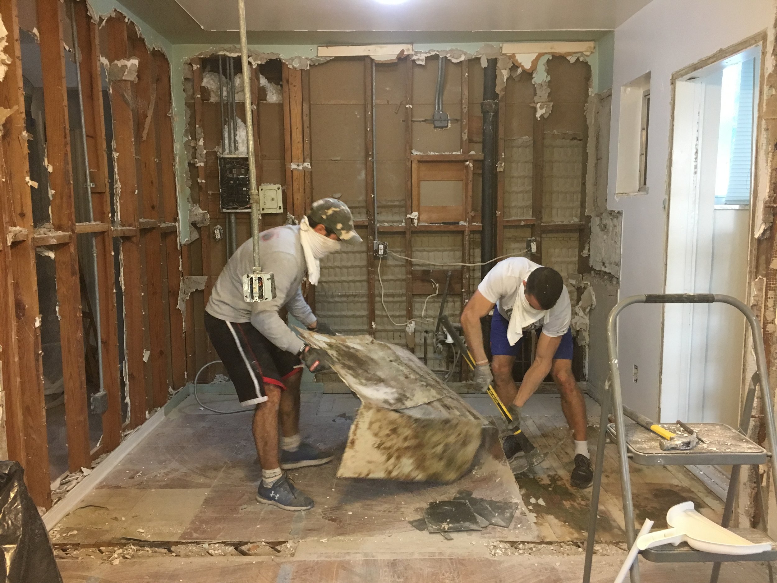  The previous kitchen had worn out parquet linoleum floors…no thank you! Goodbye old floors! 