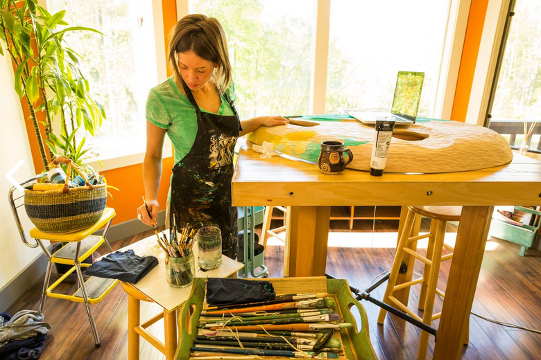 Elizabeth Ellis painting Fetal Alcohol Syndrome mask 2013. Photo by Loren Homes