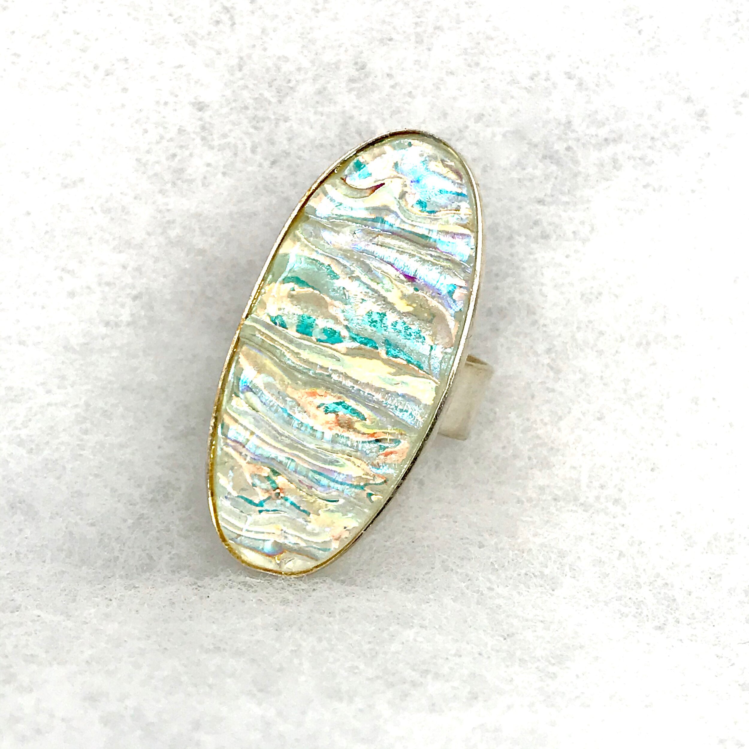 Textured Crystal Dichro Oval Ring.jpeg