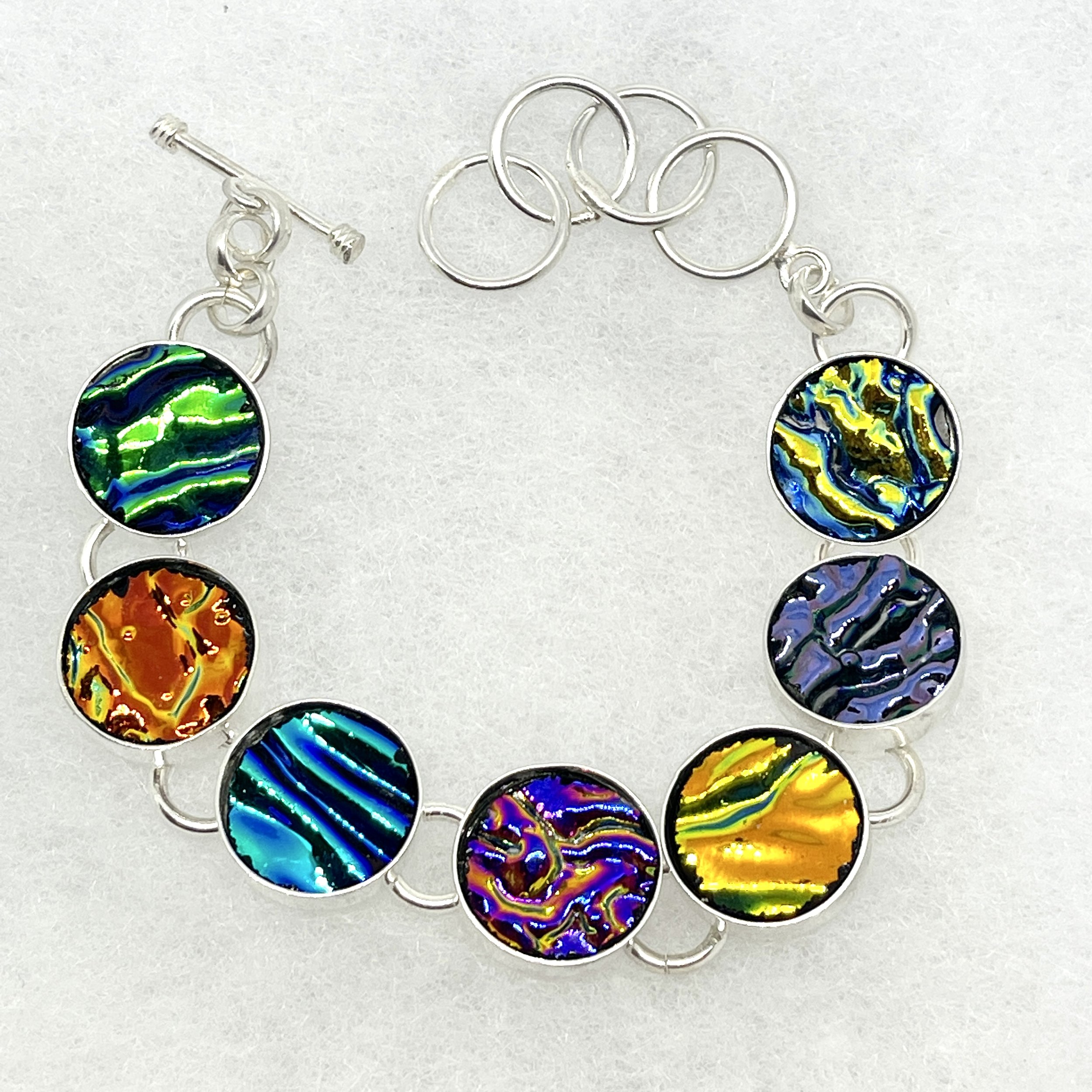 Seven Circle Textured Dichro Bracelet.jpeg