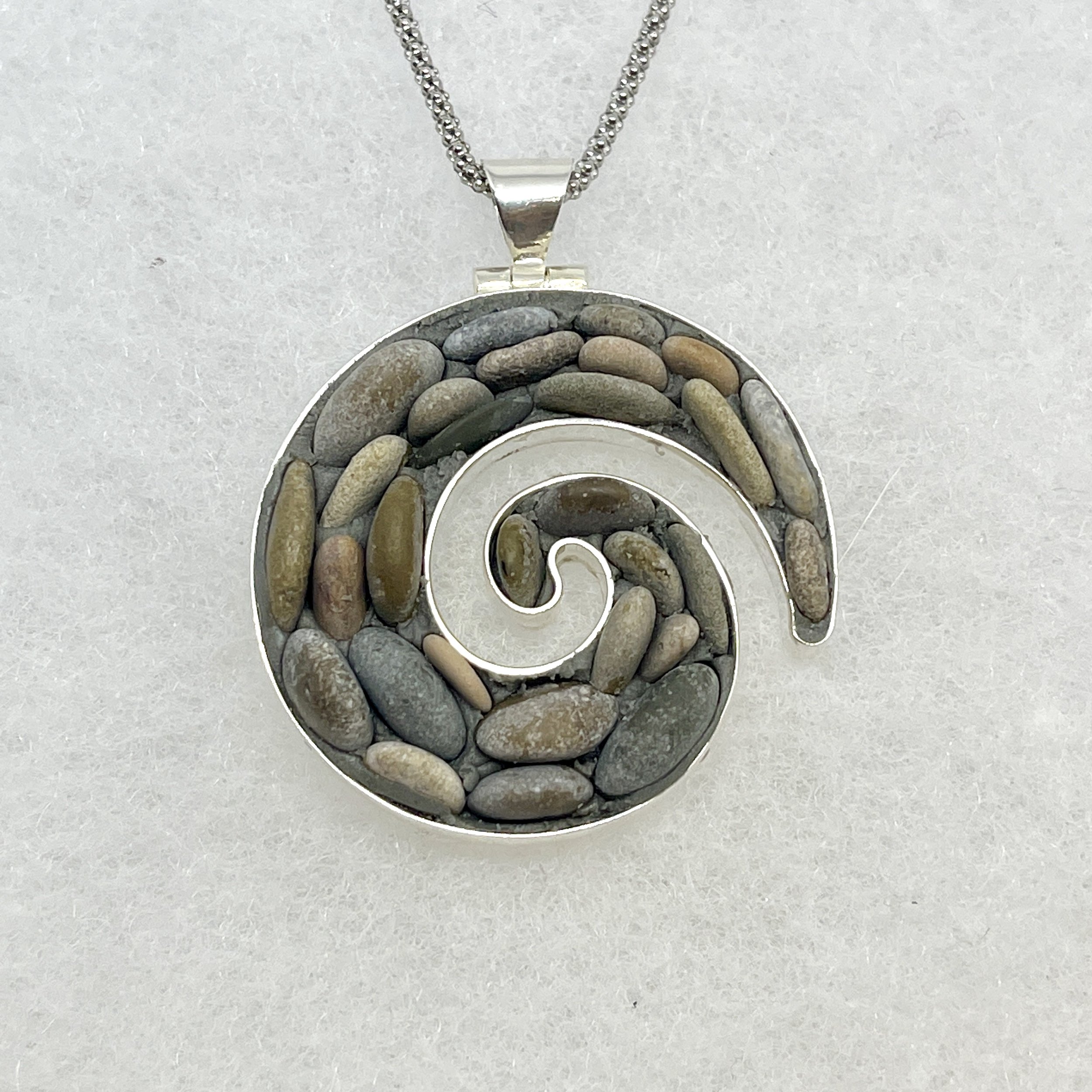 Small Pebble Koru Necklace.jpeg