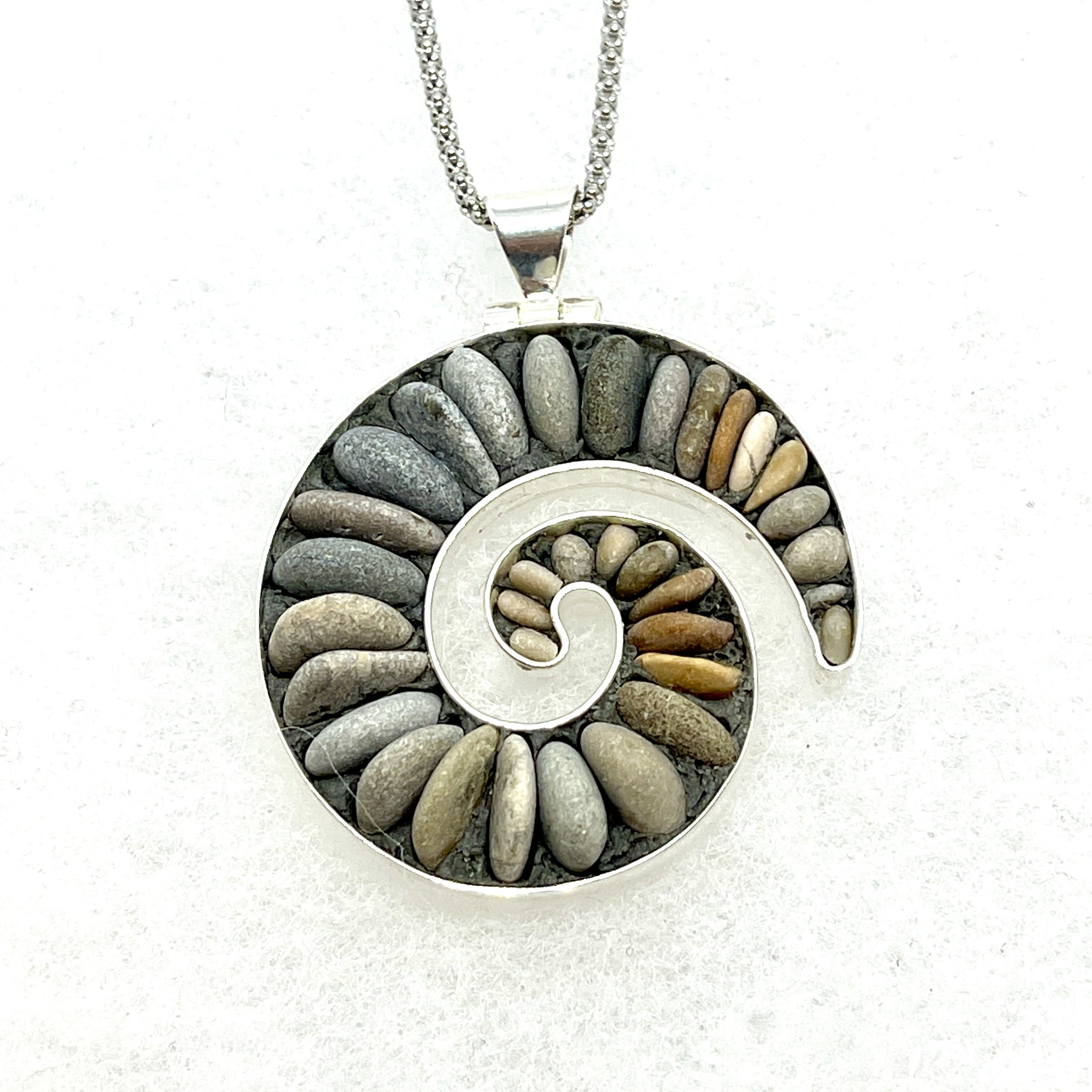 Sm Koru with Pebbles.jpeg