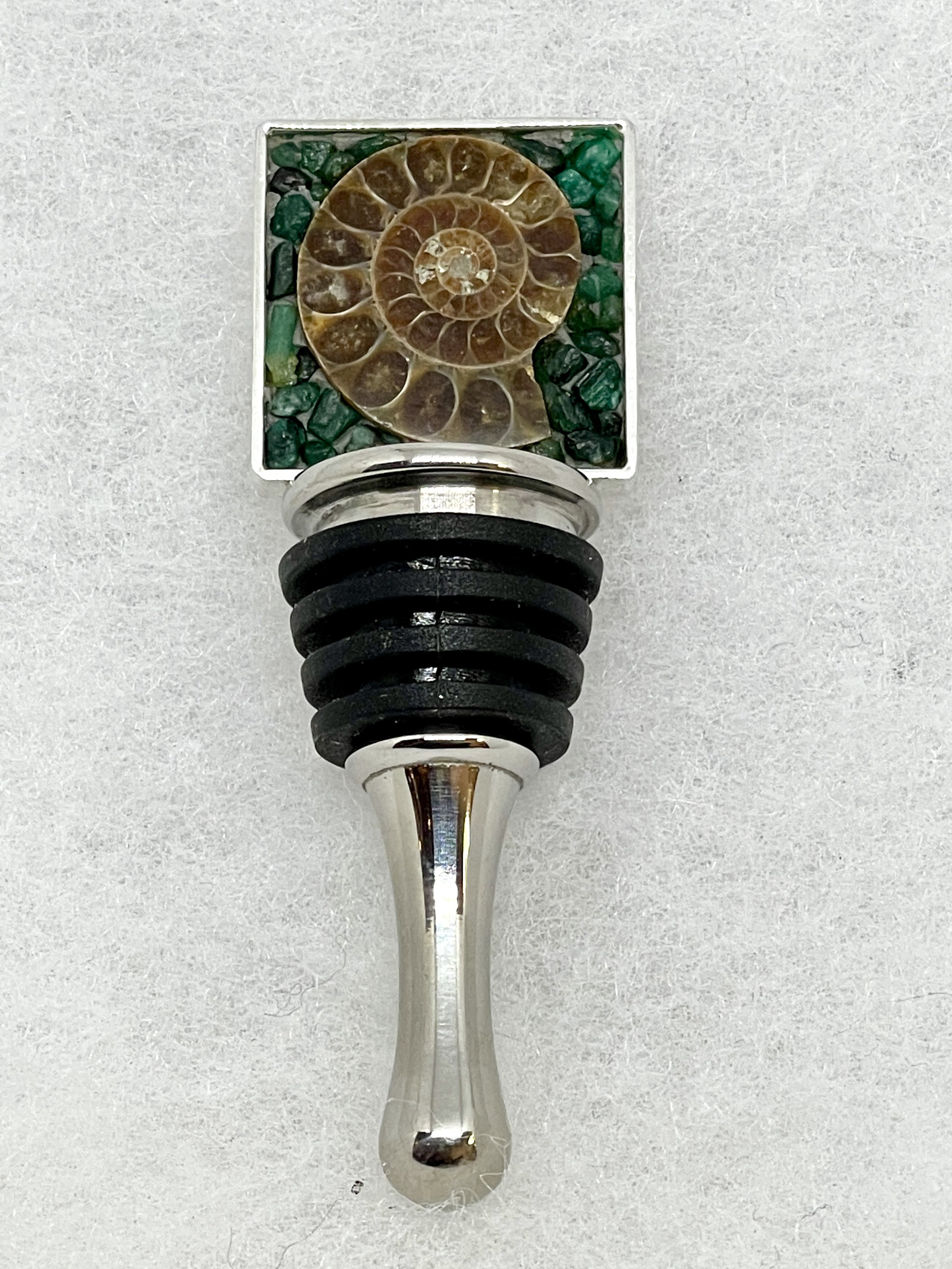 Ammonite Square Bottle Stopper with Emerald.jpeg