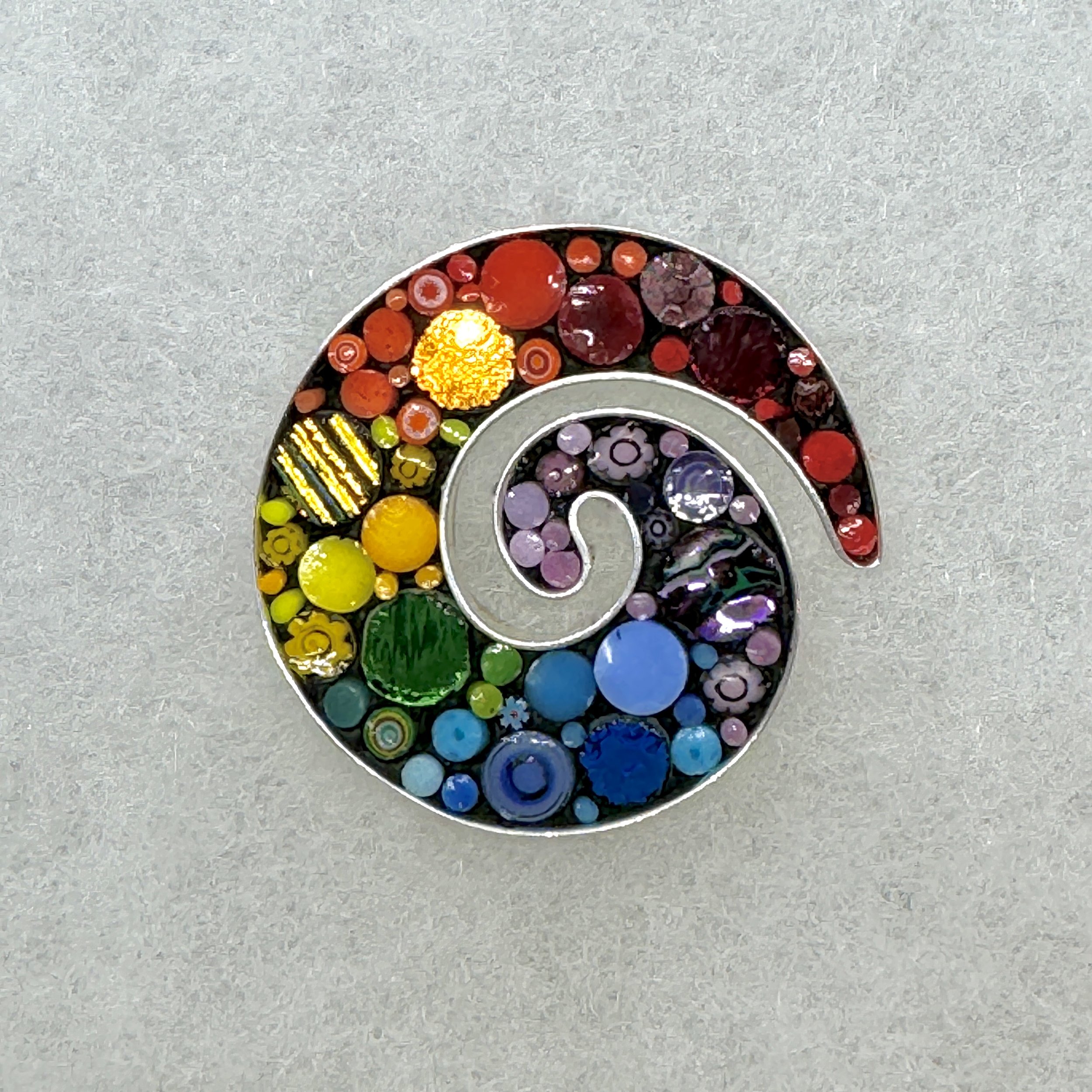 Small Koru Rainbow Brooch.jpeg