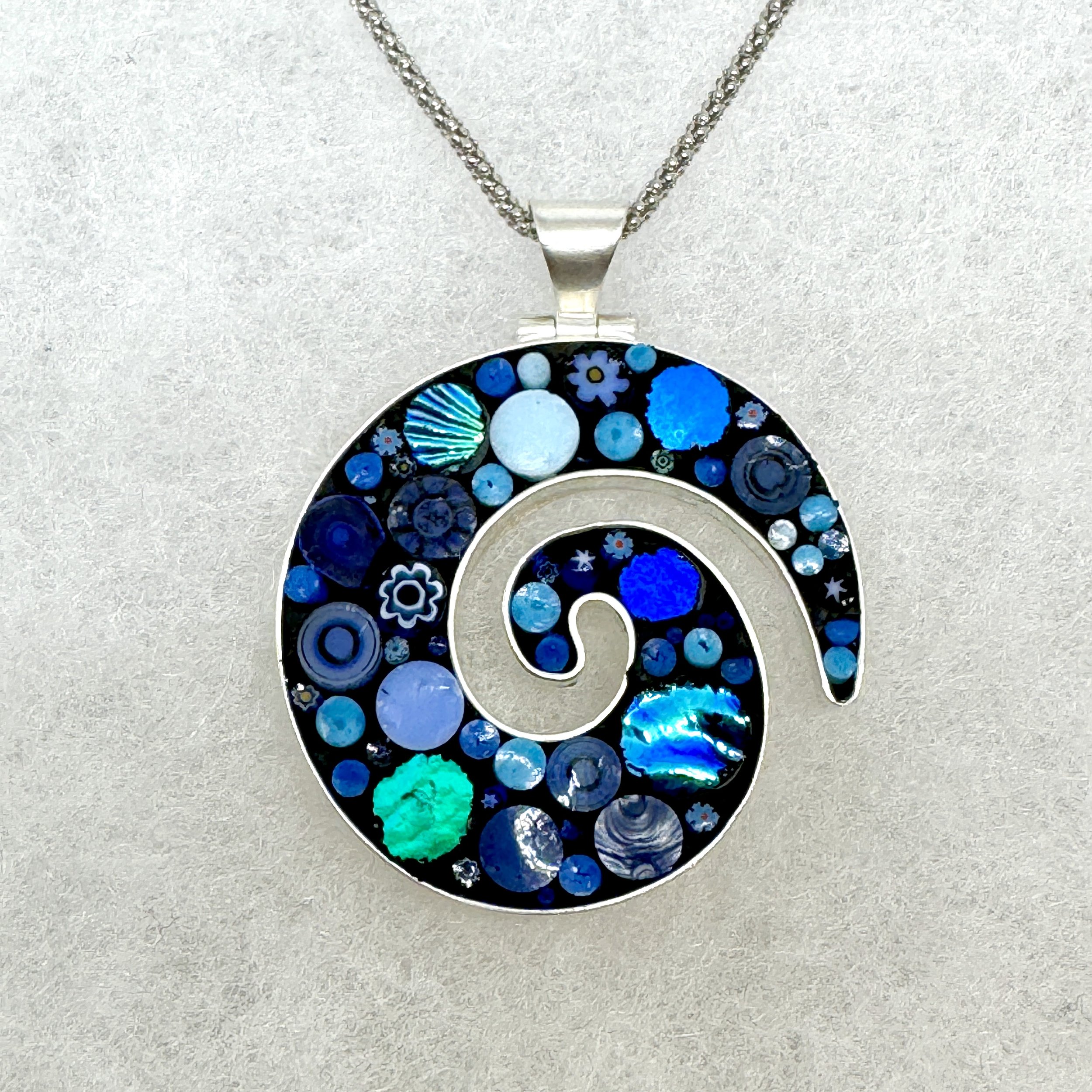 Happy Dot Sm Blue Koru Necklace.jpeg