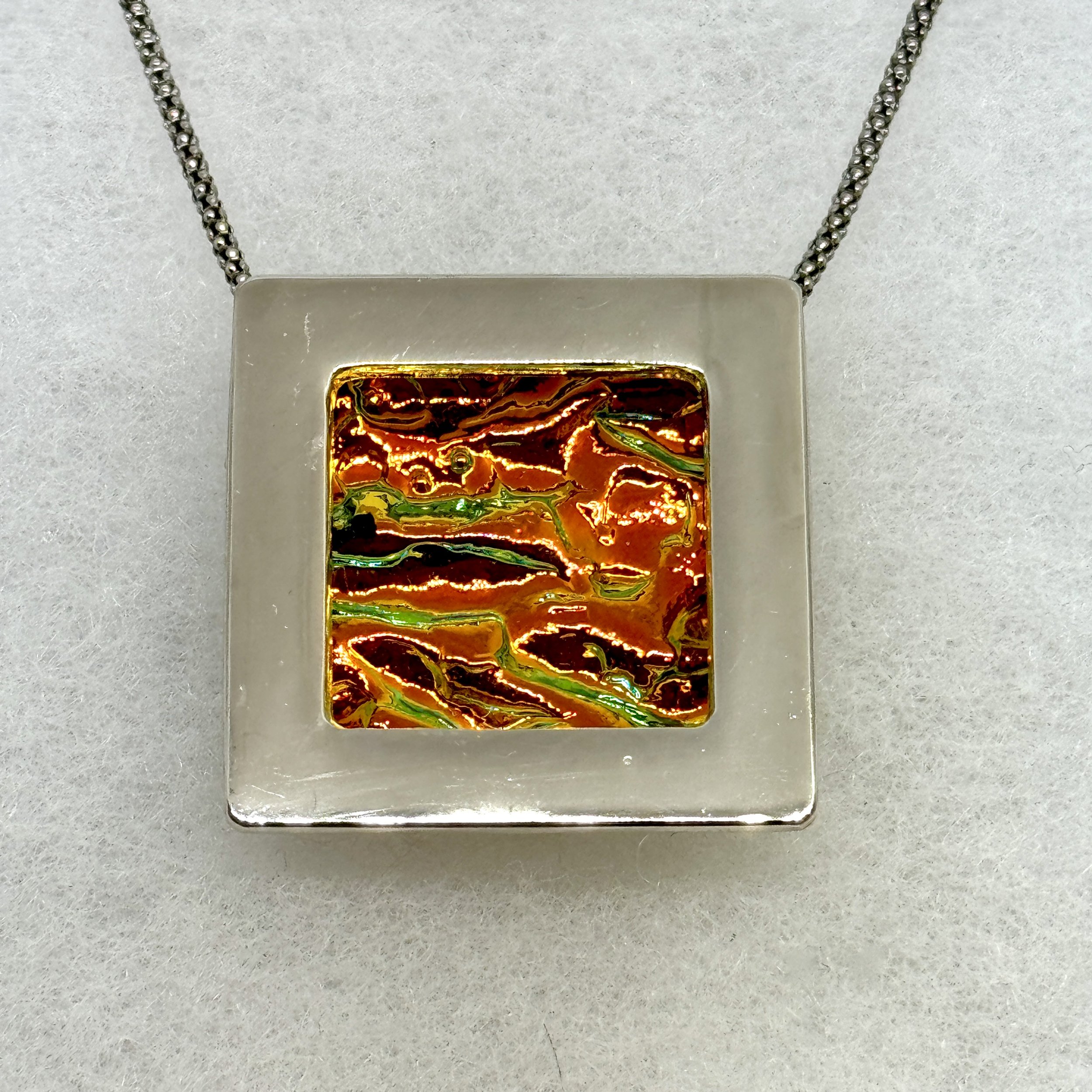 Orange Dichro Square Frame Necklace.jpeg