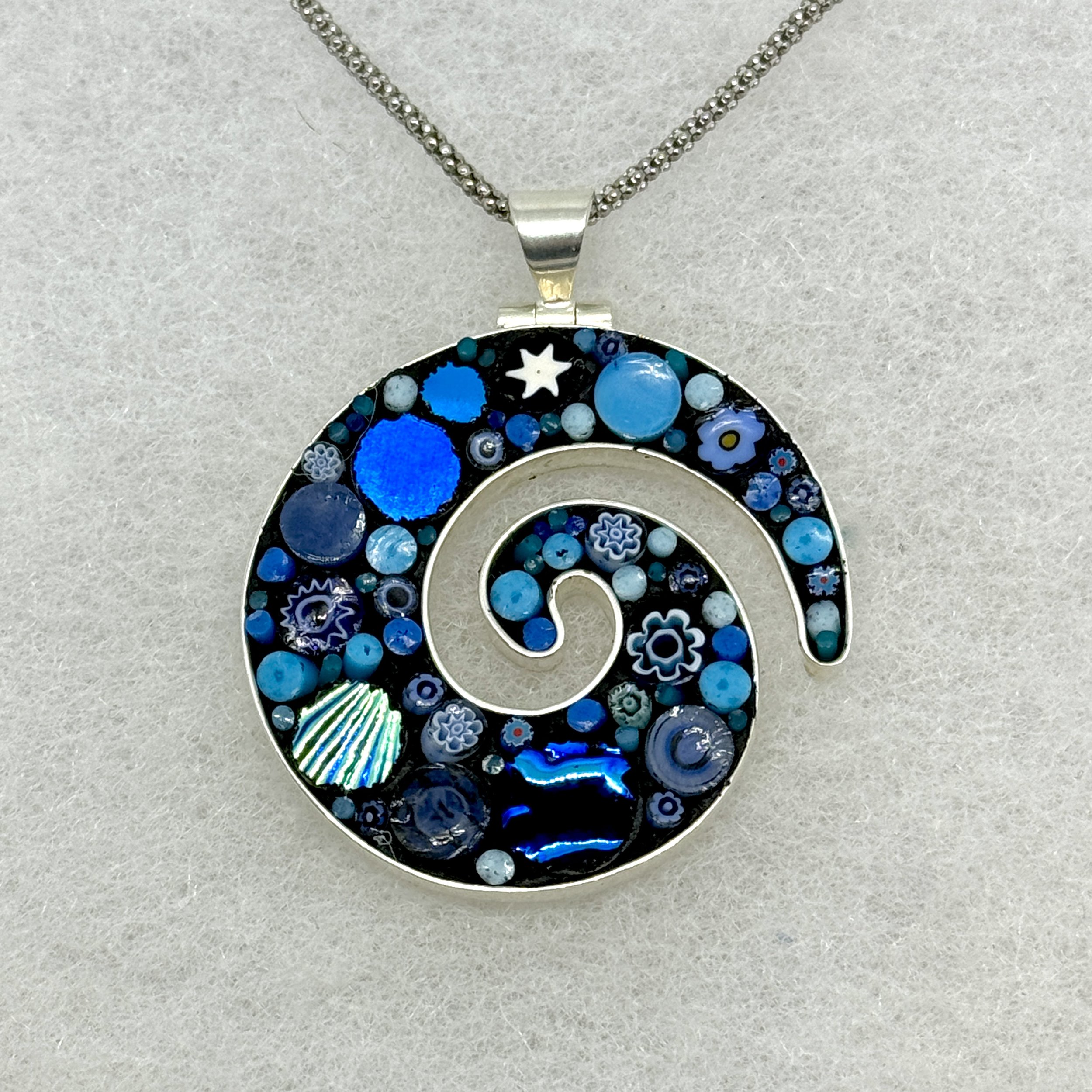 Sm Blue Happy Dot Koru.jpeg